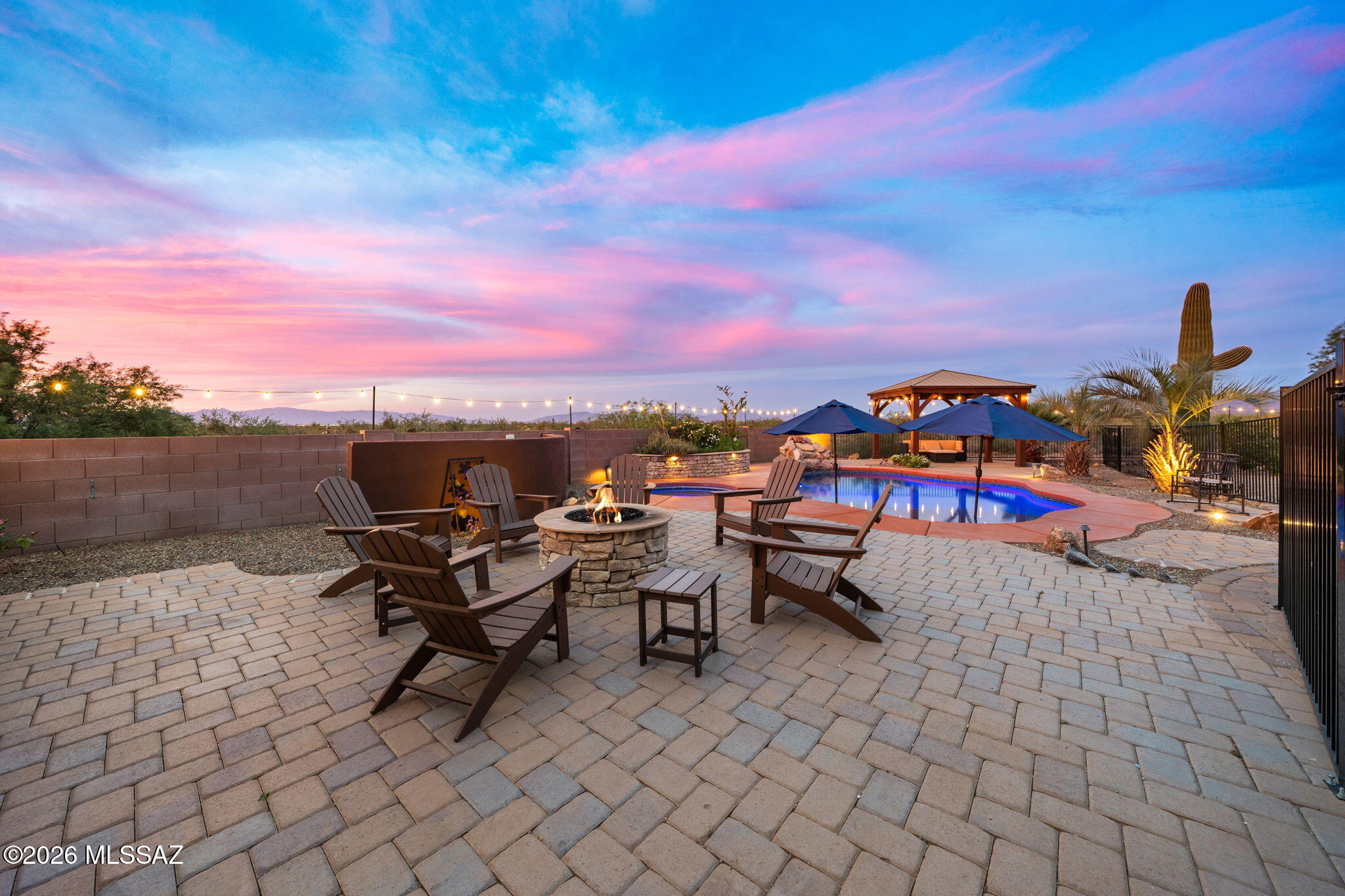 Price Improvement! Tucked away on a quiet cul-de-sac, this desert oasis perfectly blends modern comfort with a curated SOAZ indoor-outdoor lifestyle. Step inside to find an airy, light-filled floor plan designed for effortless living and entertaining. The spacious kitchen serves as the home's heart, featuring upgraded finishes and sleek appliances. Retreat to the spacious primary suite, offering a private sanctuary after a long day. The true highlight is the expansive backyard-set on a full acre of space; boasting privacy & panoramic views; Your dream outdoor retreat. Whether hosting summer BBQs or enjoying a quiet sunrise over the mountains, Experience the best of Arizona living with parks, top-rated schools, and community amenities just minutes away.