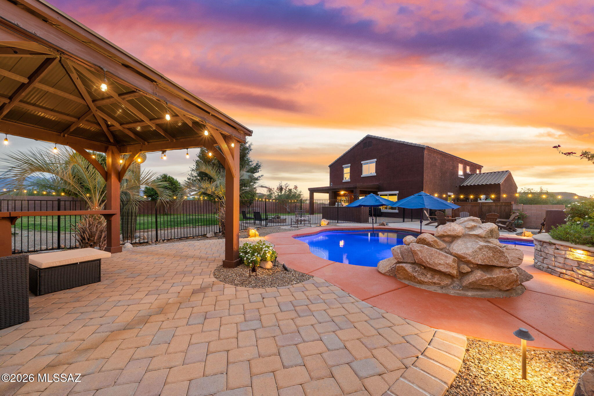 Price Improvement! Tucked away on a quiet cul-de-sac, this desert oasis perfectly blends modern comfort with a curated SOAZ indoor-outdoor lifestyle. Step inside to find an airy, light-filled floor plan designed for effortless living and entertaining. The spacious kitchen serves as the home's heart, featuring upgraded finishes and sleek appliances. Retreat to the spacious primary suite, offering a private sanctuary after a long day. The true highlight is the expansive backyard-set on a full acre of space; boasting privacy & panoramic views; Your dream outdoor retreat. Whether hosting summer BBQs or enjoying a quiet sunrise over the mountains, Experience the best of Arizona living with parks, top-rated schools, and community amenities just minutes away.