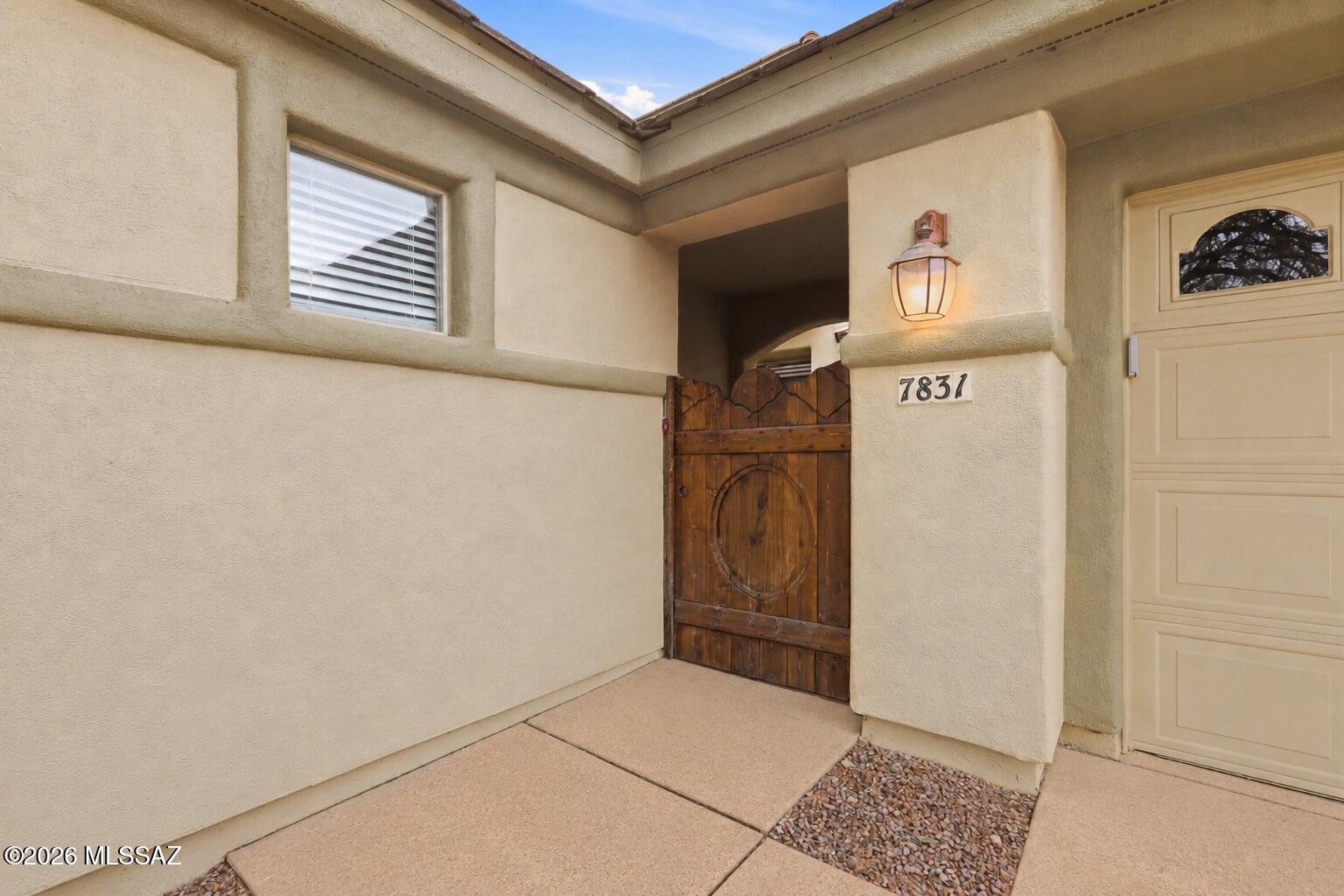 Privacy, flexibility, and a floor plan that adapts to your lifestyle set this home apart. Located within a small gated community, this property features a detached casita tucked into the front courtyard--ideal for guests, multigenerational living, a private studio, or a dedicated work-from-home space.
Inside the main home, the spacious primary suite includes an adjoining flex room that can serve as a nursery, home office, fitness space, reading retreat, or whatever your needs may be. It's a rare feature that adds versatility without sacrificing comfort.
Outside, the home enjoys an elevated lot with view fencing overlooking a natural wash and only one direct side neighbor, creating a setting that feels more private than many traditional neighborhood homes. The backyard is thoughtfully siz for easy upkeep, allowing more time to enjoy your home and less time maintaining it.
Whether you're hosting visitors in the casita, working from your private office, or relaxing in your backyard retreat, this home offers the flexibility and privacy that today's buyers are looking for--all within a desirable gated community close to shopping, dining, golf, and everyday conveniences.