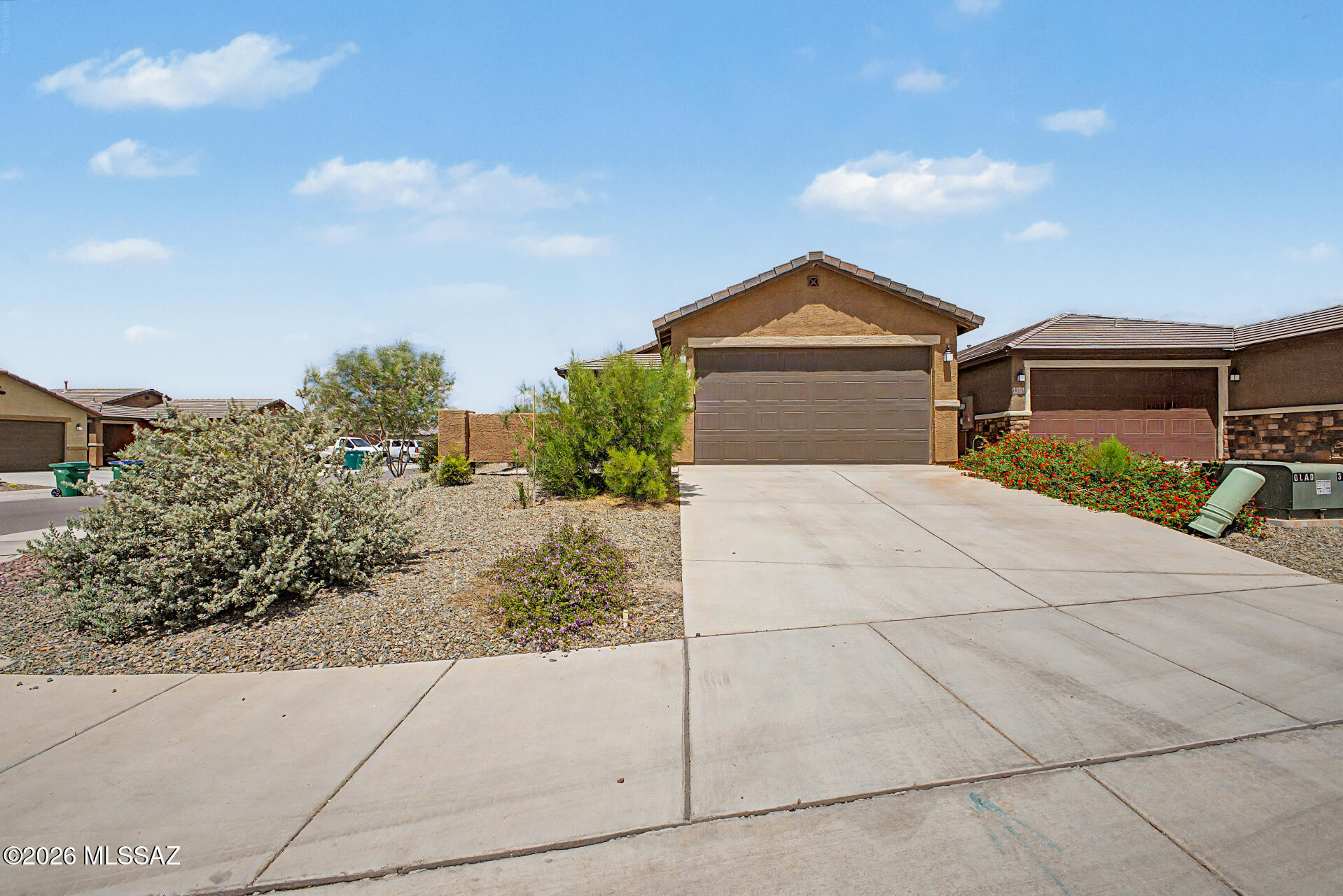 Welcome to this charming 3-bed + den, 2-bath home! Nestled on a corner lot, it displays a 2-car garage and a mature front yard. The inviting interior showcases abundant natural light, a neutral palette, 9ft flat ceilings, wood-look tile flooring in common areas, and Berber carpet in bedrooms. Designed for everyday living & entertaining, the seamlessly flowing open layout is sure to impress! The impeccable kitchen boasts SS appliances, quartz counters, navy blue hexagon backsplash, recessed lighting, white shaker cabinetry w/crown molding, and an island w/breakfast bar. Versatile den for an office! The primary bedroom has a walk-in closet and an ensuite with dual sinks. Outback, you have a covered patio, extended pavers, artificial turf, and string lights. Ready to move in! Make this yours!
