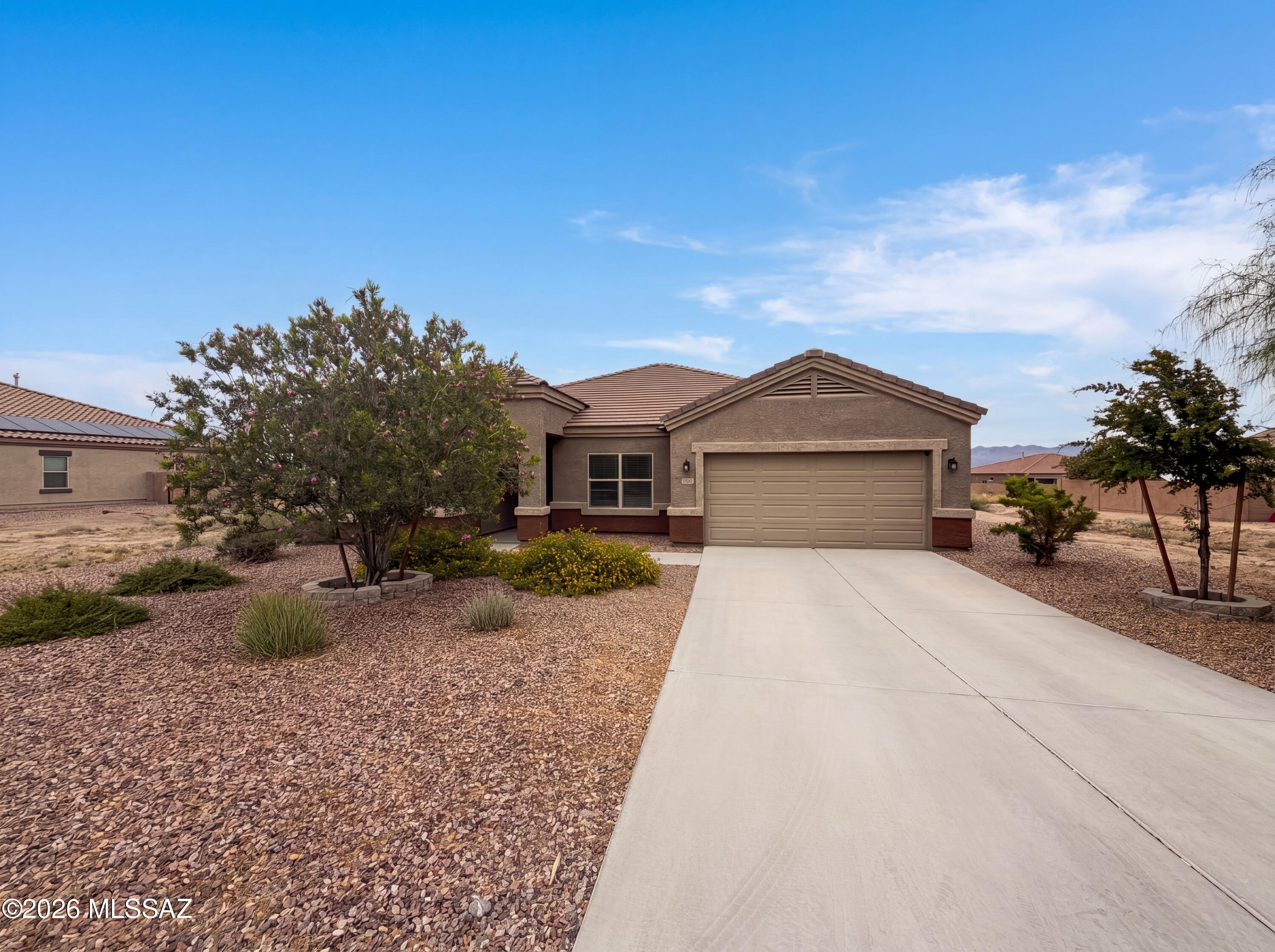 Welcome to 17967 S Camino De Las Quintas, refreshed with fresh interior paint and partial flooring replacement throughout. The kitchen includes all stainless steel appliances and a functional island. The primary bedroom features a walk in closet, while the primary bathroom contains double sinks and a separate tub and shower for comprehensive utility. Outside, a covered patio extends to a fenced in backyard. This home combines updates with functional ease, ready for you to enjoy.. Included 100-Day Home Warranty with buyer activation