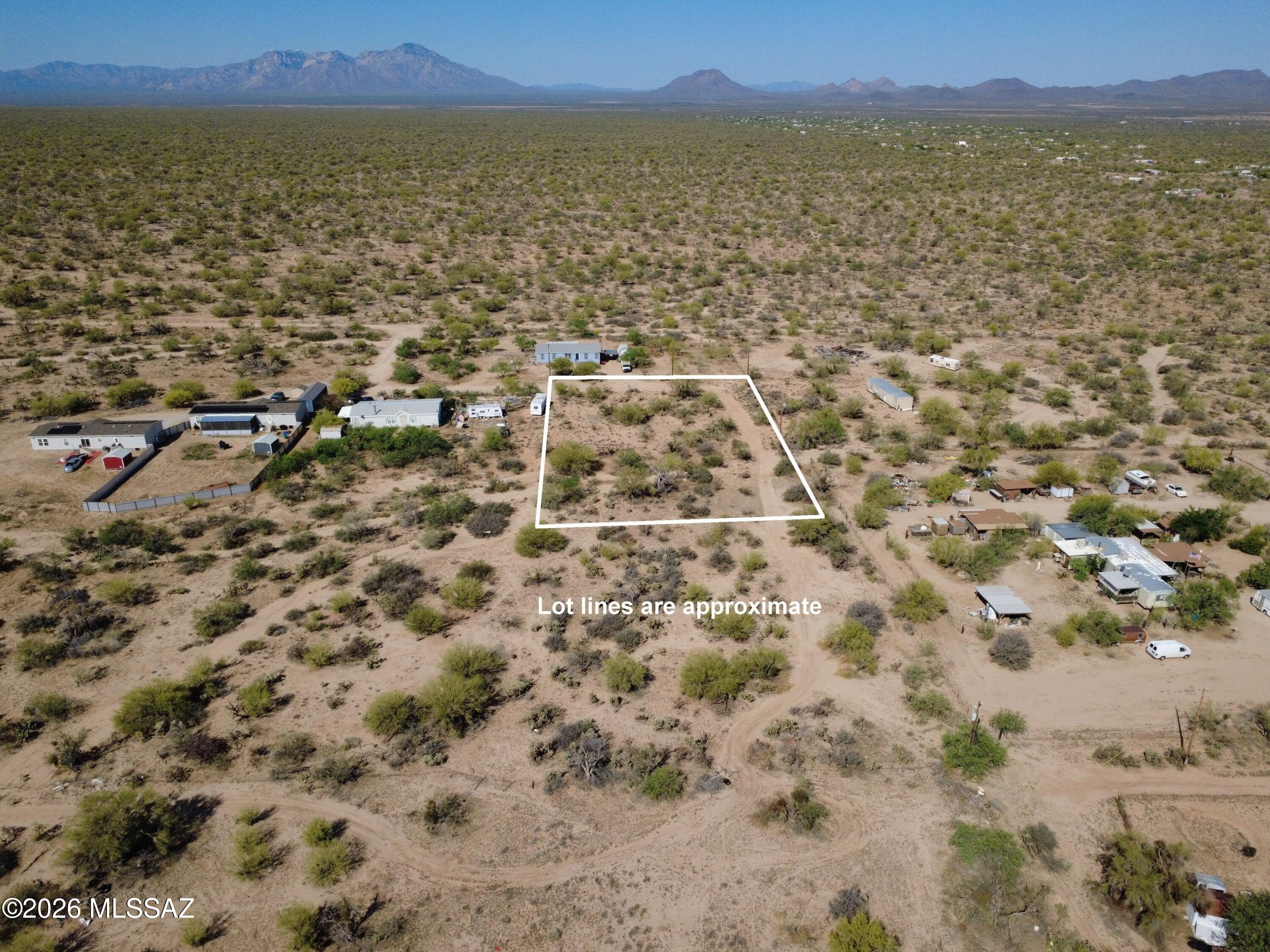 Discover the perfect blend of space, privacy, and opportunity with this 1+ acre vacant lot in Tucson's scenic southwest. Featuring an already installed septic system and electric and water at the lot line, this property offers a valuable head start for your future build, saving both time and upfront costs. Located just a few hundred feet from Arizona State Trust Land, enjoy wide-open desert and mountain views, added privacy, and direct access to endless outdoor recreation. Whether you're looking to build your dream home, place a manufactured home, or invest in land with strong potential, this lot presents a great opportunity!
