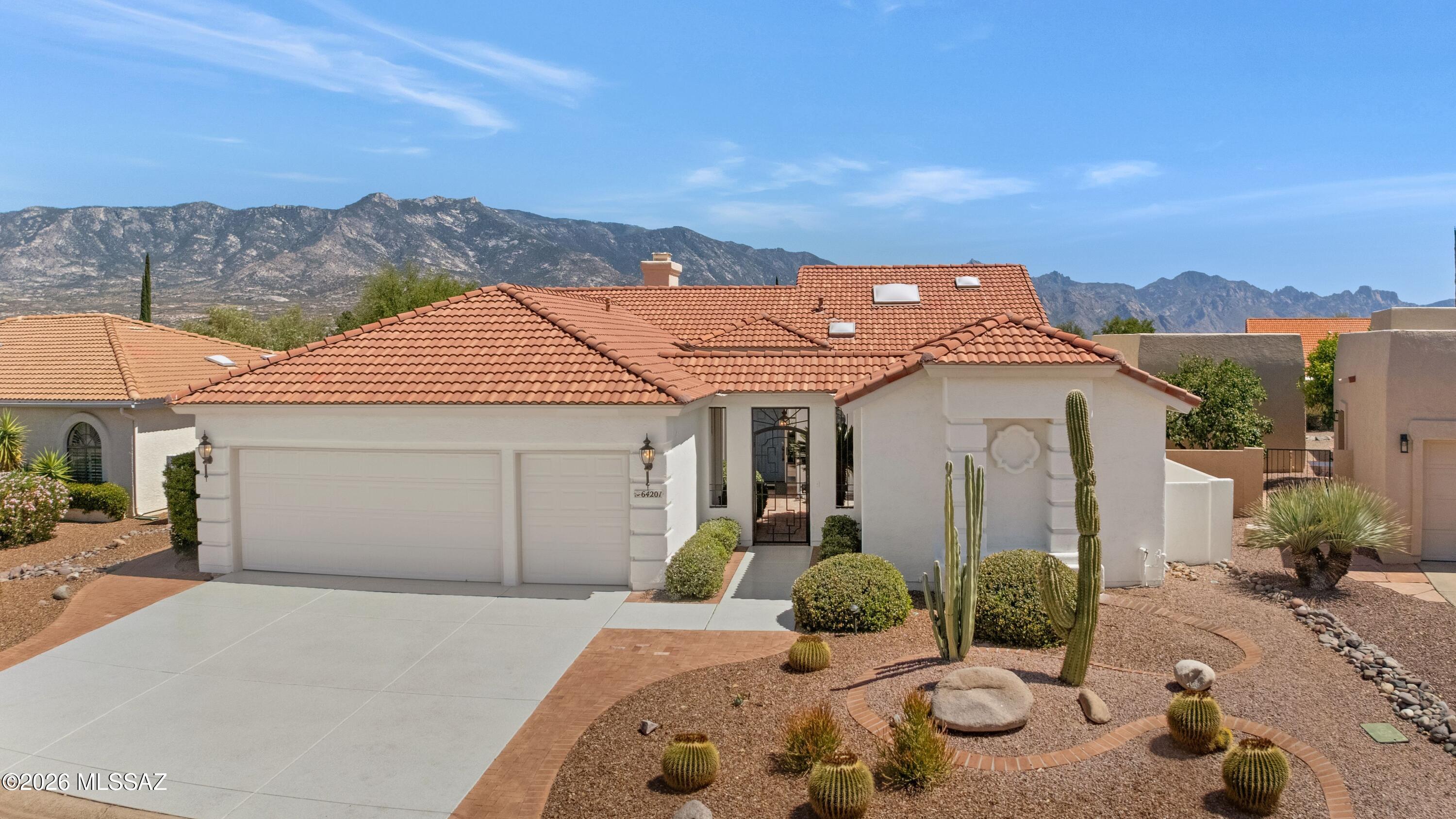 Desirable, light, bright Barcelona model- gated courtyard,private entry casita and golf cart garage. Mt.Views. Home features Family/Living/Dining rooms,no carpet,double sided fireplace,natural light and vaulted ceilings. 
New SS Wall Oven/Micro, Fridge June 12, 2026. Some new windows. Newly painted outside. New Epoxy driveway. Kitchen w/center island, 2 sinks. Loads of storage.Separate laundry w/ W/D. Primary Suite w/slider to covered patio, tranquil backyard, and Mt. views. EnSuite bath w/double vanities, large walk in closet. The private Casita w/ Murphy bed, work/craft area, full bath opens to a peaceful gated courtyard. 2.5 garage w/workbench, storage and room for all your toys. Located in a quiet cul- de sac only a 5 minute walk/3 minute golf cart ride to all SaddleBrooke1 amenities.