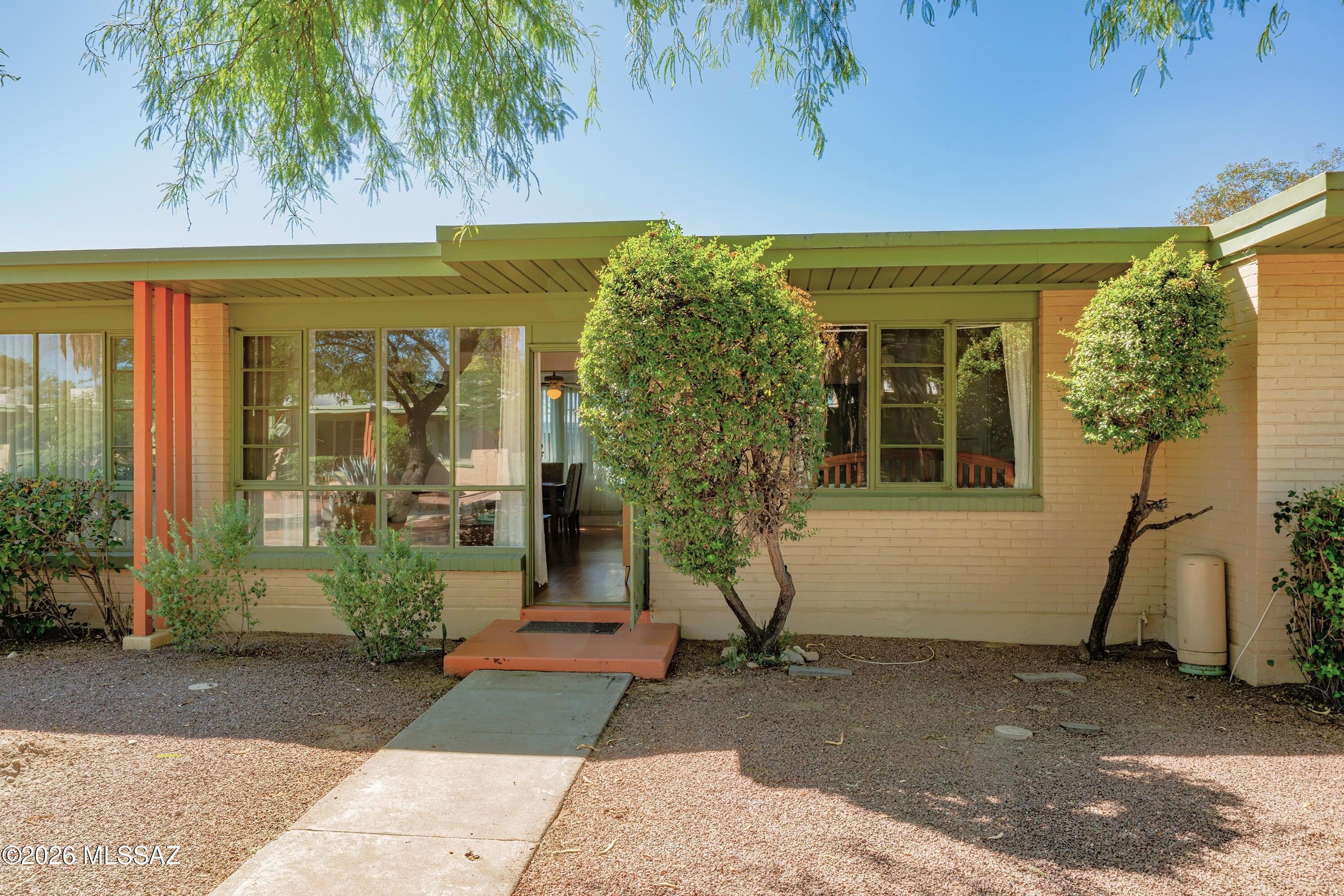 Retro cool meets mid-century charm! Welcome to Country Club Manor, historic, red-brick single level condos in the center of the city. The exceptionally lush, beautifully landscaped courtyards create a surprisingly serene setting. This stylish 1 bedroom unit has just been repainted and is ready to go. Super cute, light & bright, new hot water heater just installed.  HOA covers the roof, trash, grounds, sewer lines, water, carport parking and laundry room. Owner Occupants Only - HOA has 25% cap on rentals, which has been reached. Close to Natural Grocers, Sushi Garden, Sidecar, Falora, Laff's, U of A, and Reid Park just steps away. These units rarely appear for sale, don't delay!