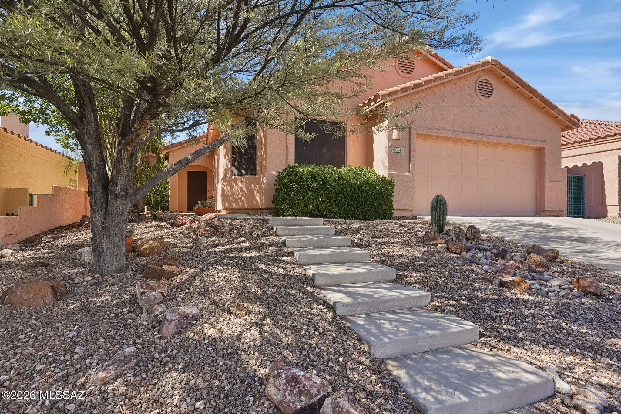 Welcome to this beautifully updated Canada Hills home, ideally situated in the heart of Oro Valley! Offering 4BD/2BA, (2117 sq ft) this inviting residence blends modern comfort with a spacious, open-concept design. Step inside to discover a light and welcoming great room that flows seamlessly into the kitchen, featuring abundant cabinetry, generous counter space and plenty of room to gather and entertain. The spacious primary suite is a relaxing retreat with private patio access and a spa-inspired bath showcasing an oversized walk-in shower. Three additional guest bedrooms offer flexibility for family, guests or a home office, complemented by a desirable split-bedroom floor plan. Enjoy Arizona living at its best from the covered patio, overlooking the open common area behind the home for added privacy and a peaceful backdrop. All this in a prime Oro Valley location, just minutes from shopping, dining, great schools, outdoor recreation and more! Some furnishings available on a separate bill of sale.
