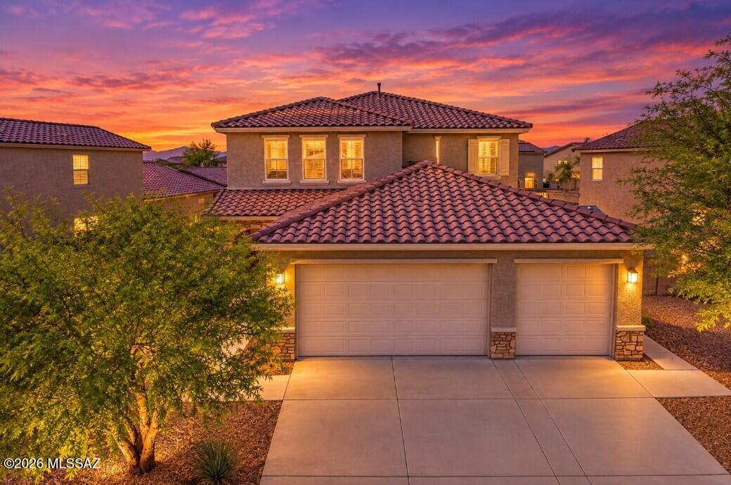 Welcome home to your 2021 Lennar-built 4 bedroom, 4 bathroom 3,005 square foot, ''Next Gen'' model retreat located in the award-winning Vail School District.  Here is your opportunity to own a rare ''Next Gen'', a home within a home that offers a separate entrance with dedicated private exterior entrance alongside an internal door connecting to the main house, fully equipped kitchenette with appliances, living area, a bedroom or multi-use room, a separate laundry space, and a bathroom. Owner/agent.  With two homes under one roof, the possibilities are endless.  Designed with a variety of needs in mind:  including multigenerational living; aging parents or adult children, lifestyle space: including home office, creative studio, gym, or private schooling area, or income property functioning a private long-term rental or guest house option.  Operating under a single mortgage and shared utility infrastructure, reducing separate housing and maintenance costs, maximizing efficiency.
The heart of the main home is an inviting and bright, light-filled kitchen with  granite countertops, extended upper cabinets, and a spacious walk-in pantry overlooking a generous great room.  At the top of the stairs, you will find a versatile loft, two additional bedrooms, and a laundry room with an attached bonus space for use as a pocket office, craft room, storage space, etc.  On the second level, you will also find your beautiful primary suite and spa-like bath featuring double vanities, large glass enclosed shower, and an oversized walk-in closet.  Your fully landscaped yard, with BBQ grill and firepit, is the perfect place to entertain on an Arizona evening.  Located on a desirable premium lot.  This beautiful, thoughtfully upgraded home is move-in ready for your family! Located in the highly desirable La Estancia community where you will love the great selection of schools available within the sought after Vail School District.  La Estancia has direct access to 'The Loop', an interconnected system of more than 120 miles of paved pathways and bike lanes, as well as a community pool, basketball court and several beautiful parks.  La Estancia is within close proximity to many major employers, including Davis-Monthan AFB, Tucson International Airport, UA Tech Park, Raytheon and Amazon. Reach out for your private tour of this stunning home today!