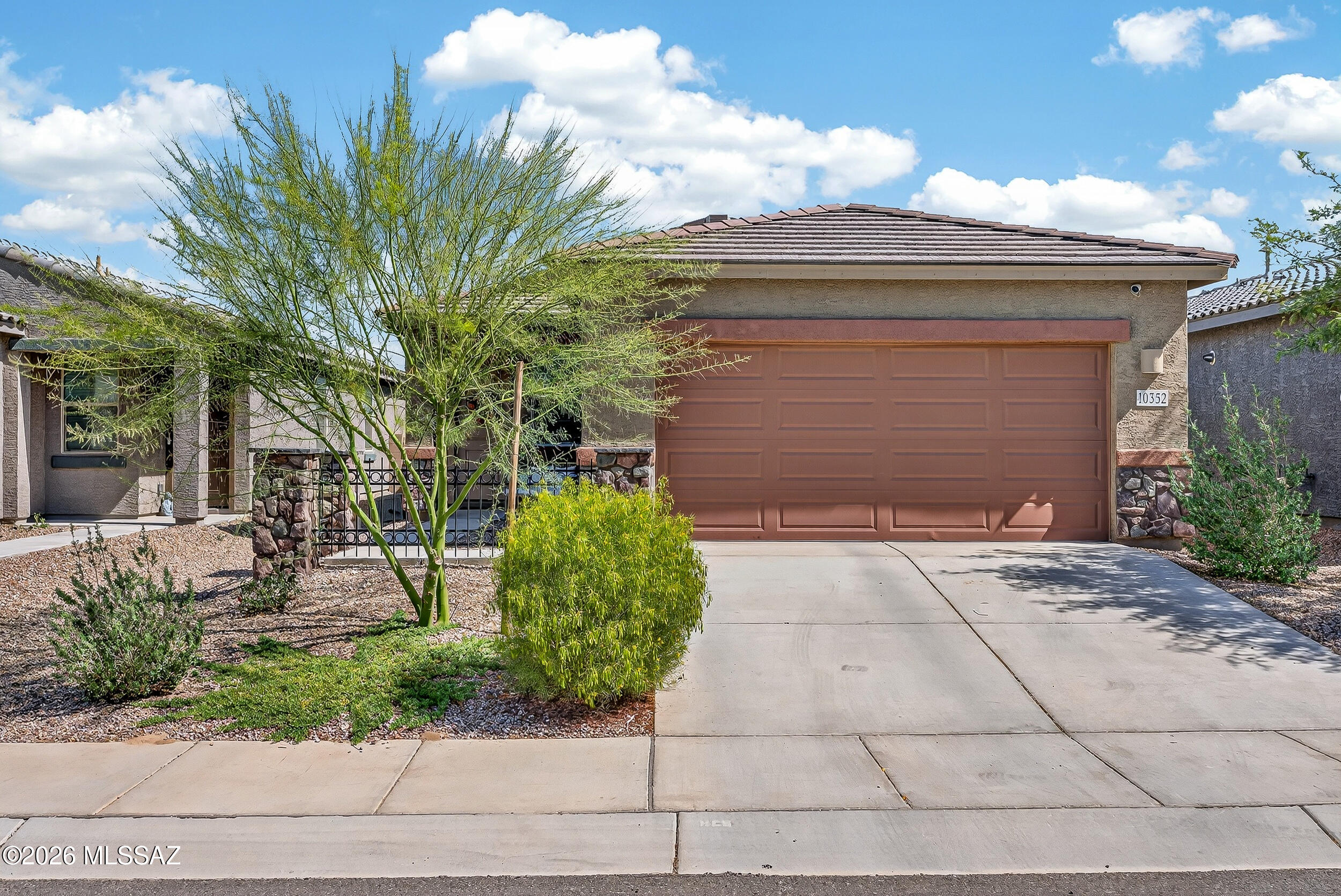 Discover this beautiful 2024 built 4BD/2BA home!! The inviting open floor plan shines w/extended-height dark wood cabinetry, sleek granite counters, huge kitchen island w/breakfast bar, pendant lighting & SS appliances. Enjoy a tankless water heater, security system & smart thermostat. Spacious owner's suite delivers mountain views & an elegant owner's bath w/walk-in shower & huge walk-in closet. All bedrooms feature BRAND NEW CARPET, w/ceiling fans thru-out. Enjoy tile floors in main living areas & a 2-car garage. Stone pillars w/decorative wrought iron welcome you to the covered front entry. Unwind under the covered patio on the large open paver area or relax in the natural grass w/WiFi sprinkler system. Near parks, trails, shopping/dining & MARC!! This move-in ready gem is a MUST see!!