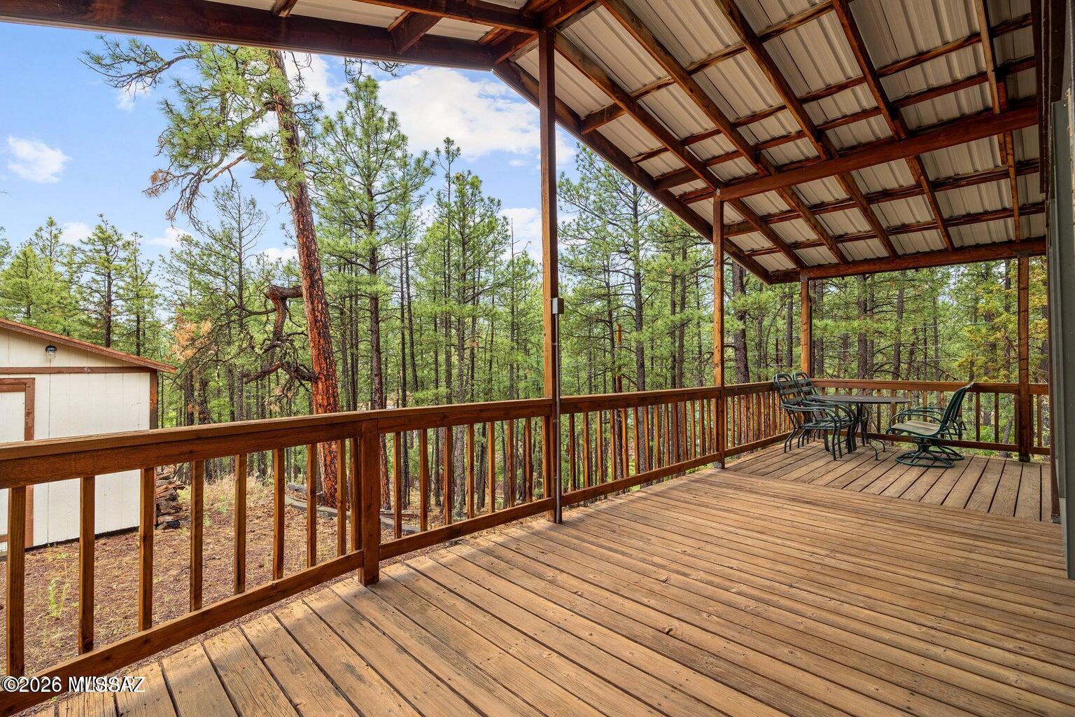Turn Key Furnished Home + New Price + Seller Financing + An Extra Lot Included! Ready to move in!! This is a rare Alpine opportunity: the price includes a meticulously cared-for FULLY FURNISHED mountain home plus a complete extra lot, with city water and sewer already available. Whether you are looking for a weekend getaway, a summer retreat for your family, or a turnkey investment opportunity, this property is ready to enjoy. Tucked among the tall pines in the heart of Alpine, this well-cared-for 2-bedroom, 1-bath manufactured home offers 854 square feet of comfortable mountain living on a half-acre, consisting of two separate lots. With Alpine city water and sewer, marked property corners, and no HOA, this property is set up for easy ownership.
Step outside onto the impressive 900 square feet of covered wraparound deck, the perfect place to enjoy your morning coffee, watch the wildlife, and take in the peaceful, private setting. The home features a well-appointed floor plan with a spacious kitchen, eat-in dining area, comfortable living room with a beautiful wood stove, dual-pane windows, and a primary bedroom with built-in storage for clothing and personal items.
The second parcel offers excellent potential for a future garage, RV parking, extra storage, or expanded outdoor use. On the east side of the home, the property borders the forest, giving you direct access to nature right out your front door.
A rare bonus: seller financing is available, and an insurance policy is already in place. With easy highway access, close proximity to town, and strong summer demand in Alpine, this would be perfect as a family weekend getaway, vacation rental, or Airbnb-style investment home to accommodate summer travelers escaping the heat.
Alpine is known for world-class hunting and fishing, hiking and biking trails, lakes, rivers, streams, and cool mountain summers--perfect for outdoor enthusiasts looking to escape the Valley heat. With corrected pricing based on today's market, this home is positioned for a quick sale.
This one won't last long. Call today to schedule your private showing.