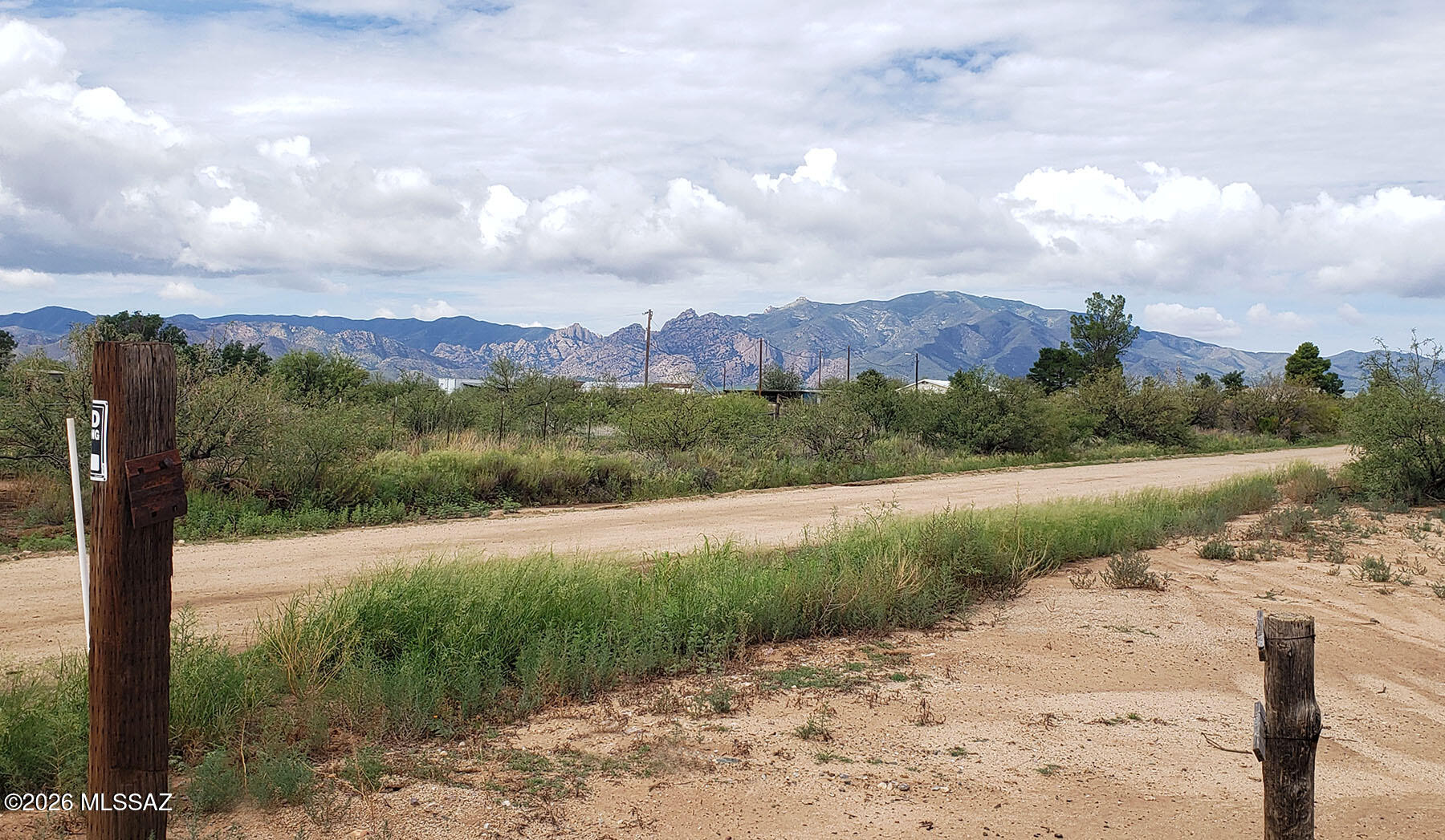 A newer septic system has been recently installed on this RU-4 zoned 5-acre parcel in Richland Ranchettes, giving you a head start on development. A mobile home previously on the property has been sold and removed, leaving a clean, ready-to-build site. Power, phone, and fiber are at the lot with quick access to Highway 191 and easy trips to Benson or Willcox. Partially fenced. Flat topography makes building straightforward, and zoning allows manufactured, mobile, or site-built dwellings, including the Cochise County owner-builder opt-out. A well share may be available, or drill your own well or haul water. Panoramic mountain views at approximately 4,500 feet elevation mean mild summers and a solid growing season. Don't miss out on this unique opportunity for upgraded Cochise County land.
