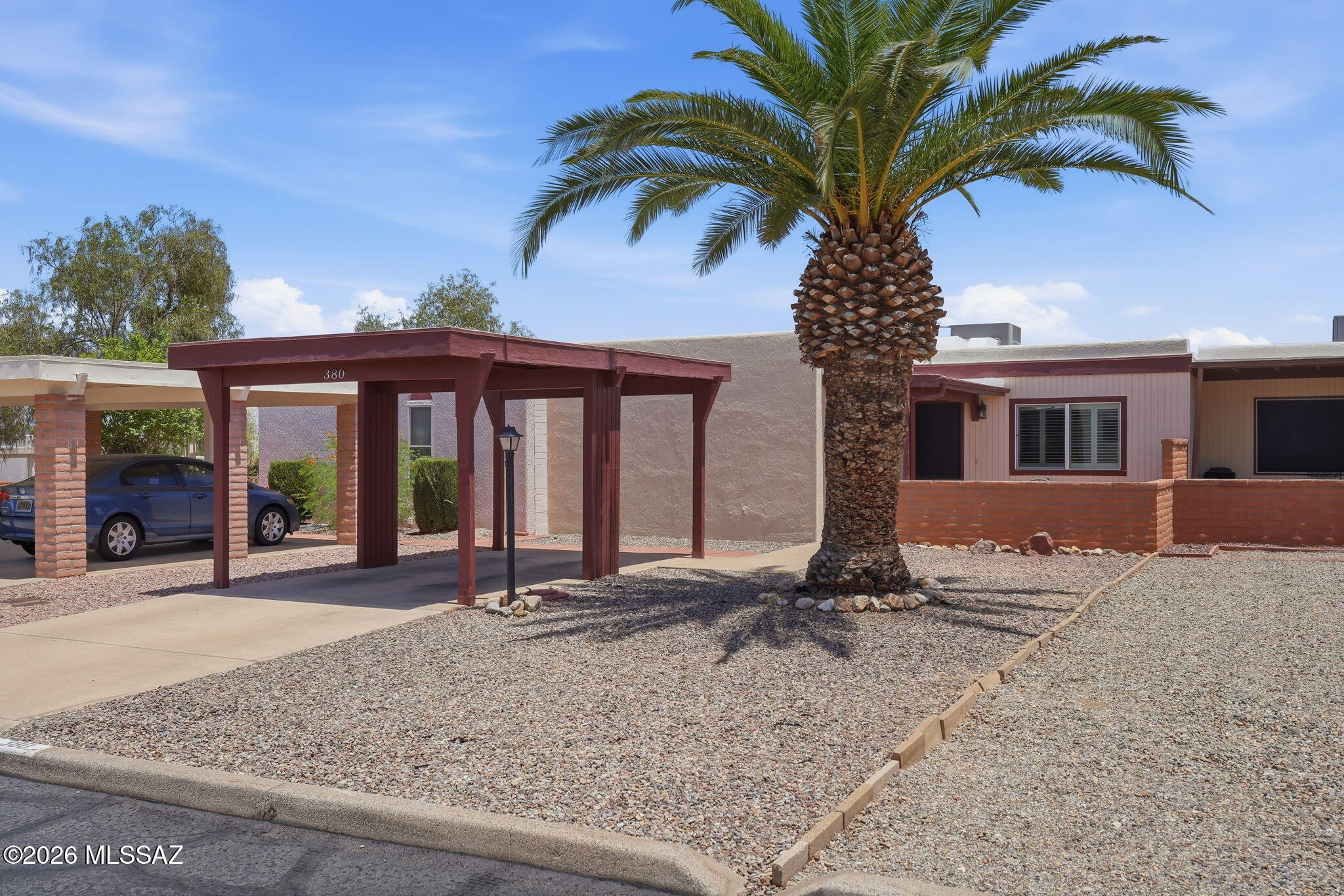 Move-In Ready and Priced to Sell! Don't miss this exceptional value in Casa Paloma II! This furnished 2-bed, 2-bath townhome has 1,276 sq. ft. of easy-care living with a heated and cooled AZ Room and beautiful mountain view. Just bring your suitcase! The charming enclosed front courtyard, beautiful new front door, and security screen door, create a warm welcome. Recent updates include HVAC (2019), GE washer/dryer (2024), whole-house surge protector (2019), ceiling fan (2026), kitchen faucet (2026), newer windows, sunscreens, and Hunter Douglas shutters. In 2025, the exterior was painted and the roof was recoated in 2026. Enjoy the convenience of a one-car carport, low-maintenance living, and Casa Paloma II's community pool. All centrally located near shopping, golf, restaurants and more!