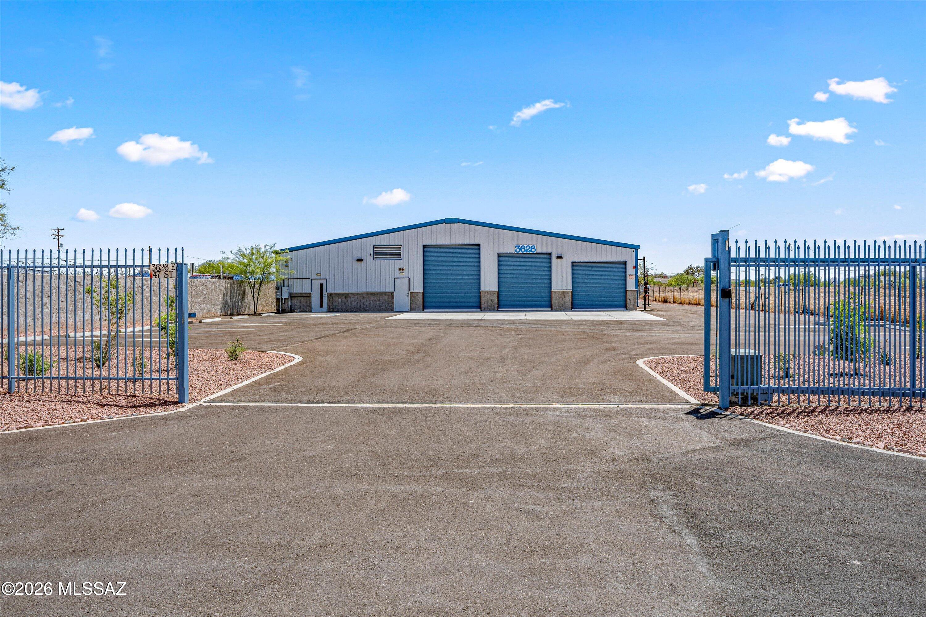Industrial warehouse, 8800 sf, .75 acre CI2 zone features eight roll-up bay doors with 14', 12', and 10' clearances, providing flexible loading options for a variety of vehicle and equipment types. The yard is secured with perimeter fencing and an electric gate, offering controlled access and full usability of the paved lot.  This property offers excellent connectivity with quick access to I 10 and Aviation Parkway, making it ideal for distribution, fabrication, logistics, or service operations.  
Inside, the building includes a modern office suite, two restrooms, and AC cooled office space. The warehouse is equipped with three new evaporative coolers, ensuring comfortable working conditions. Additional improvements include landscaping with a drip system and 480 volts of 3 phase power, supporting heavy equipment and high demand electrical needs.
A versatile, well maintained industrial asset ready for immediate use. Situated in Pima County jurisdiction with 6.1% sales tax.