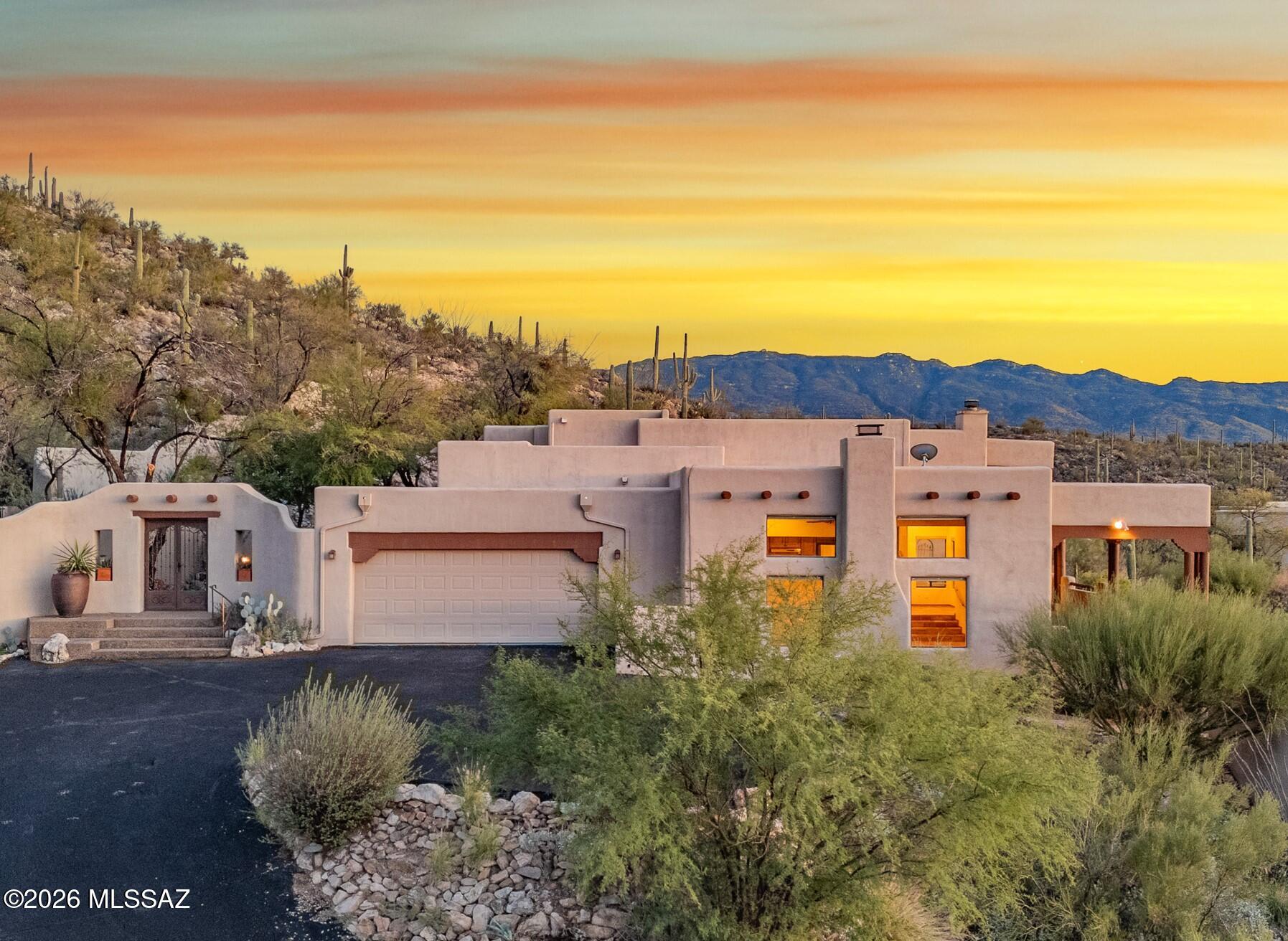 Range Pricing, Seller will consider offers between $1,000,000 and $1,195,000. Gated Redington Ranch horse property with spectacular city & mountain views! This 3.2-acre hilltop desert sanctuary offers the ultimate Arizona lifestyle. Horse lovers will enjoy the full-service stable, corral & endless trails. Main home features classic Southwestern finishes: Saltillo tile, viga beamed ceilings & wood-burning fireplaces. Separate guest quarters features a private entrance & kitchenette. Resort-style community amenities include a pool, clubhouse, tennis, pickleball & peaceful pond. Multiple indoor/outdoor living spaces boast a serene waterfall & scenic walkway perfect for entertaining. Don't miss the designated Desert Tortoise retreat! Near hiking, golf, dining & shopping.