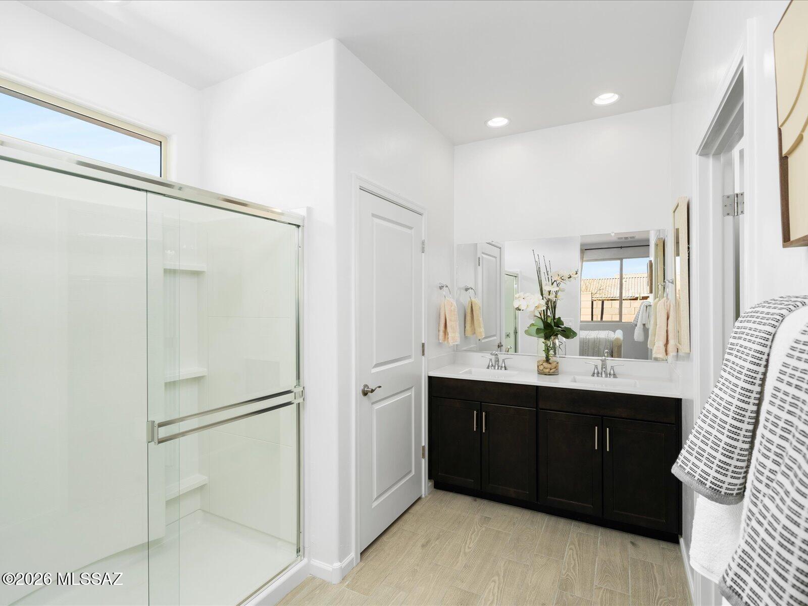 Move-in ready and designed for easy living! This beautifully crafted 3-bedroom, 2-bath home features an open-concept layout perfect for gathering with family and friends. Enjoy outdoor living on the covered patio, plus abundant storage with a spacious kitchen pantry and dedicated linen and coat closets. Located in Las Patrias at Star Valley Phase III - Signature Series, this Tucson community offers quick access to I-10, downtown Tucson, major employment centers, walking and biking trails, and playgrounds. This move-in-ready home includes a washer, dryer, refrigerator, and whole-home blinds. Built with innovative energy-efficient features, it's designed to provide comfort, convenience, and long-term savings.