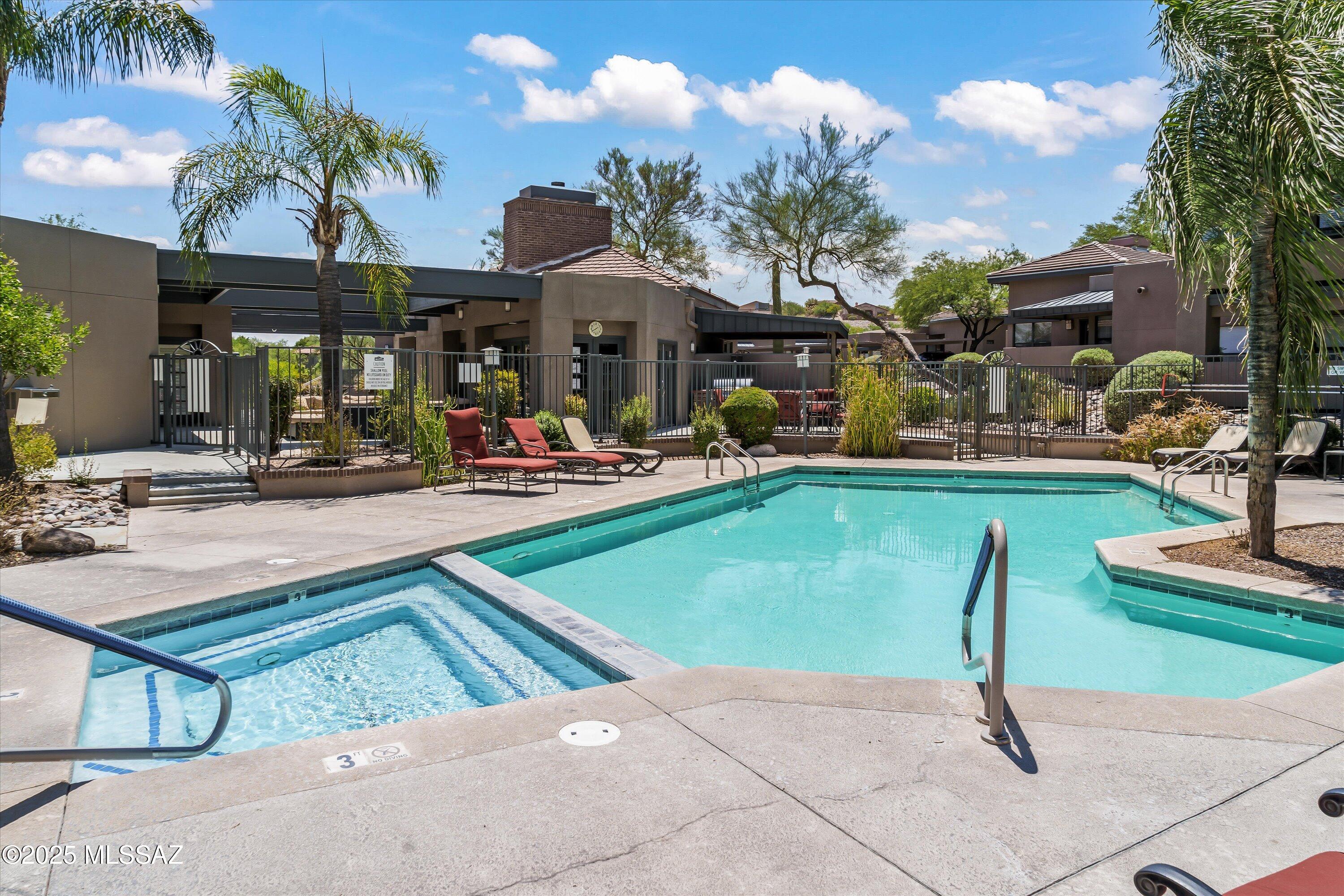 Experience resort-style living in the heart of Ventana Canyon. Located in desirable Building #1, this ground-level residence offers effortless access, Catalina Mountain views, and a private covered patio. The open-concept floor plan features tile flooring, spacious bedrooms with en-suite baths, and a bright living area. A valuable bonus is the private storage room, ideal for golf clubs, bicycles, luggage, and outdoor gear. Residents enjoy a resort-style pool, fitness center, and beautifully maintained grounds. Just minutes from Sabino Canyon, Ventana Canyon Golf & Racquet Club, hiking, shopping, and dining. Weekly rentals permitted offering exceptional flexibility for owners and investors alike.