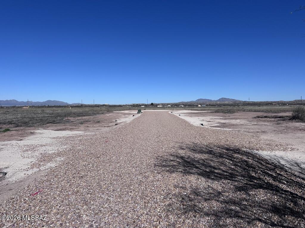 LOT A* Rare opportunity to own acreage in the quiet Pomerene area, offering excellent potential for custom home construction or a small builder/investment project. These five lots are located on a developed cul-de-sac just off Colony Road, providing privacy, functionality, and an efficient layout. Electric and water are available to the lot lines, reducing upfront development costs. Access is provided by a gravel road, and a new survey has been completed. Tax records currently reflect the original parcel and do not yet show the recent lot configuration. Whether you are looking to build a thoughtfully designed custom home or capitalize on a multi-lot opportunity for future homes, this property offers flexibility, open space, and peaceful rural surroundings with convenient access to town.