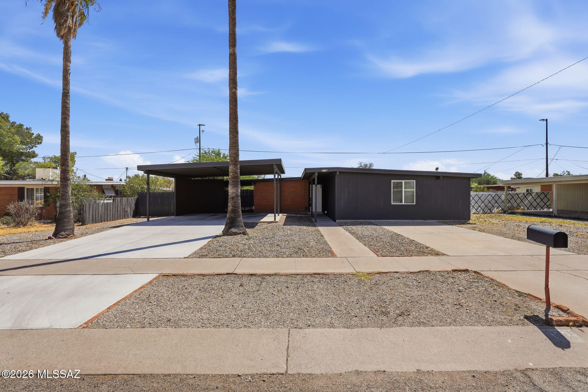 Incredible 3 bedroom, 2 bathroom home on Tucson's East side! Located in the wonderful & established Carriage Hill neighborhood. The home was recently completely remodeled including a fully permitted and approved addition of a brand new master suite. The living space is bright, spacious, & open concept giving in a modern feel. The kitchen sparkles with its white cabinets, quartz counter tops, and stainless steel appliances. The master suite is like nothing you will find in the neighborhood. Permitted and completed 3 years ago it is beautiful and has the features of a new builds. There is an incredubly big on suite closet with tons of storage and built ins, and the on suite bathroom will wow you! The home also features electric rolling shutters for security, and lots of parking. AGENT/OWNER