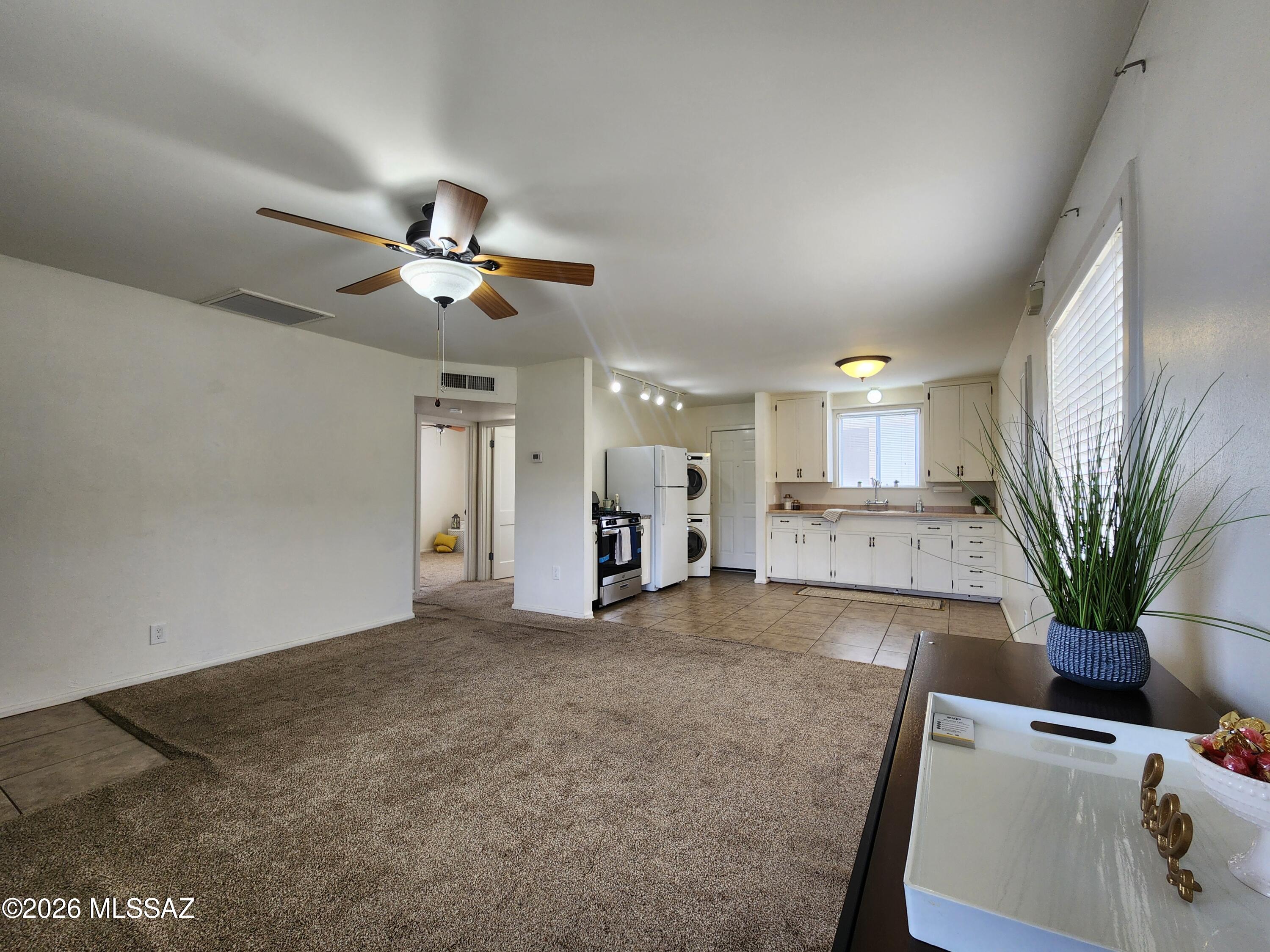 Vintage Bisbee charm meets thoughtful modern updates! This adorable 1949 bungalow offers 2 bedrooms and 1 bath, blending classic character with comfortable updates. Enjoy mountain views from the covered front patio, with updated windows, newer roof and water heater, plus a new stove and stacked washer/dryer. The bathroom features a pedestal sink, newer dual-flush commode, tub and grab bars. Set on a corner lot just 2 miles from the heart of Old Bisbee, the property also offers a detached garage and a detached studio/creative space with windows and its own patio--perfect for an art studio, workshop, office or hobby retreat. Cozy, character-filled and quintessentially Bisbee!