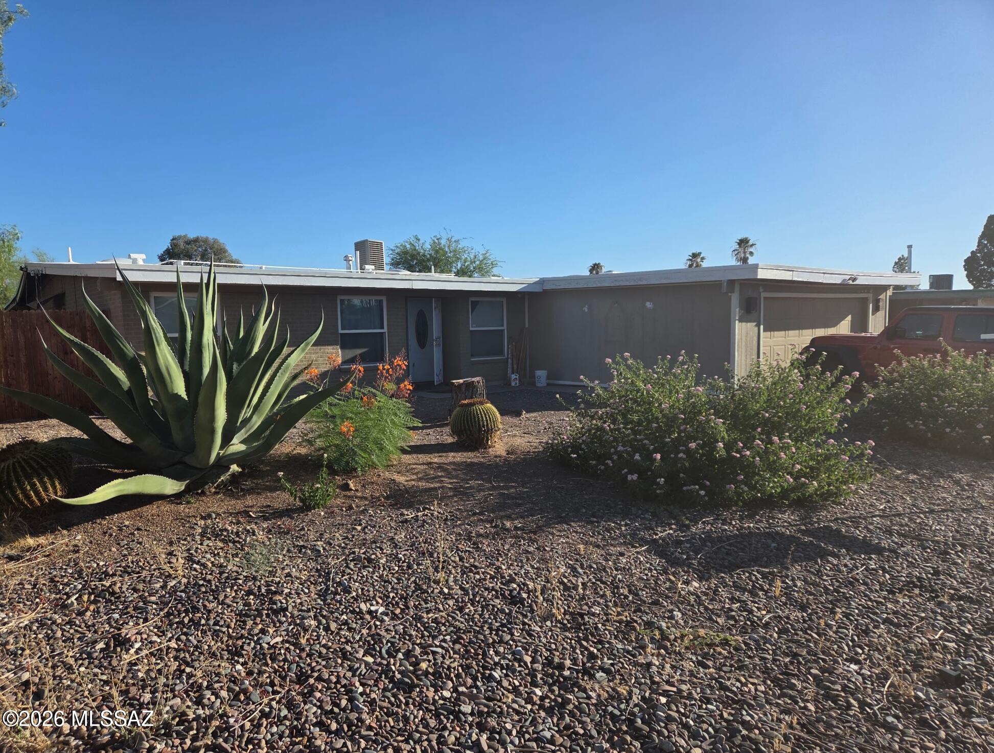 Open and airy 3 bed/ 2 bath with granite counters, Arizona room, converted bedroom with walk-in closet and storage.