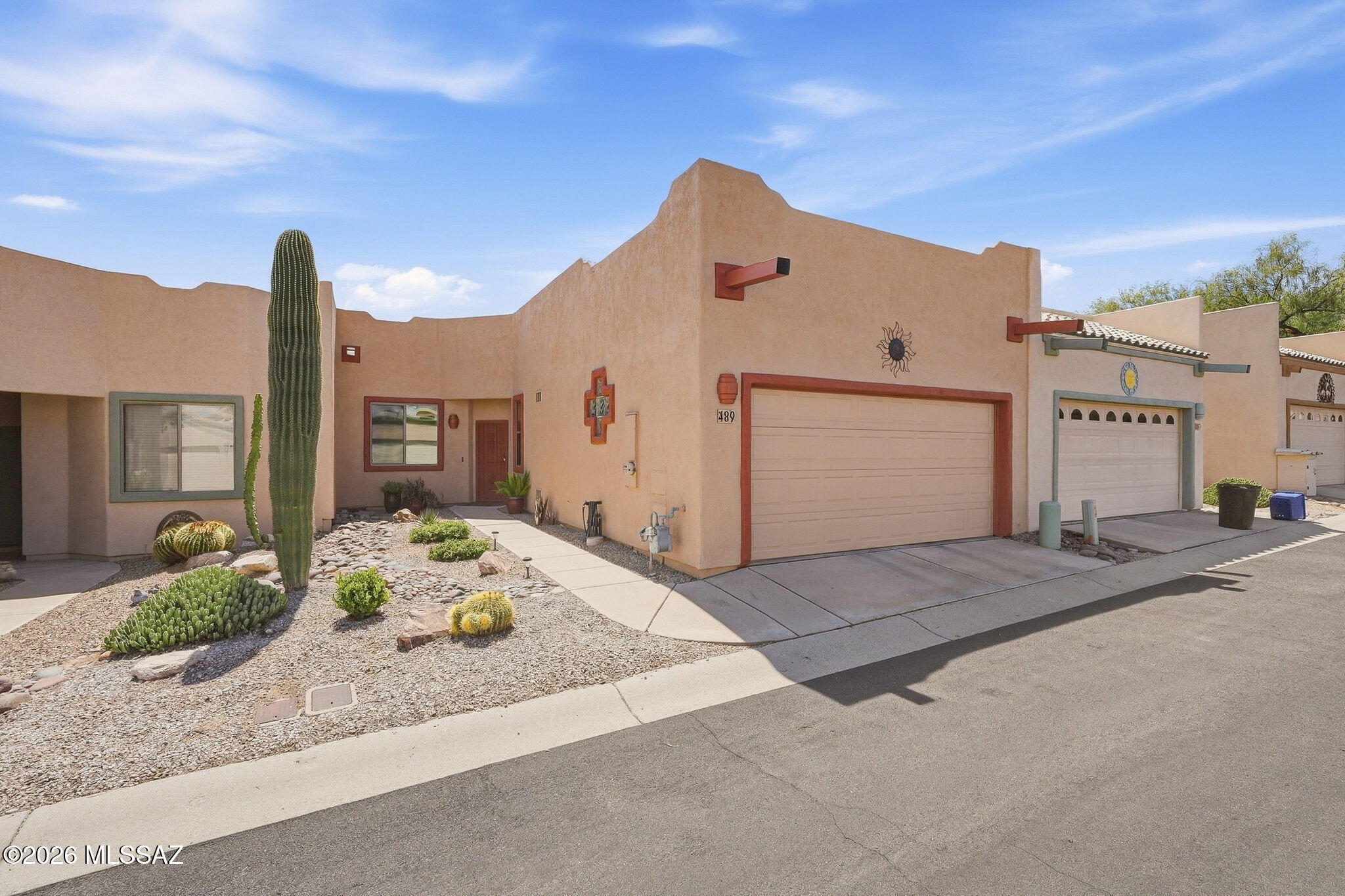 Welcome to this beautifully maintained townhouse in the desirable Canyon View neighborhood of Green Valley, where comfortable living meets the beauty of the Arizona landscape. Enjoy mountain views from the backyard and a spacious, property-length covered patio--an ideal setting for relaxing, entertaining, and taking in the gorgeous Arizona skies.

Inside, the open floor plan creates an inviting flow between the kitchen, dining area, and living room. The kitchen overlooks a convenient breakfast bar and main living space, while a cozy gas fireplace adds warmth and character to the living room. Just off the kitchen, a charming breakfast nook provides additional dining space and features a generous pantry closet for added storage. The primary suite offers a peaceful retreat with a bay window, walk-in closet, and private en suite complete with a walk-in shower. Meticulously cared for and exceptionally clean, this pristine property reflects true pride of ownership and is ready for you to move in and make it your own.

Come experience the relaxed Green Valley lifestyle, beautiful mountain views, and inviting indoor-outdoor living this Canyon View townhouse has to offer.
