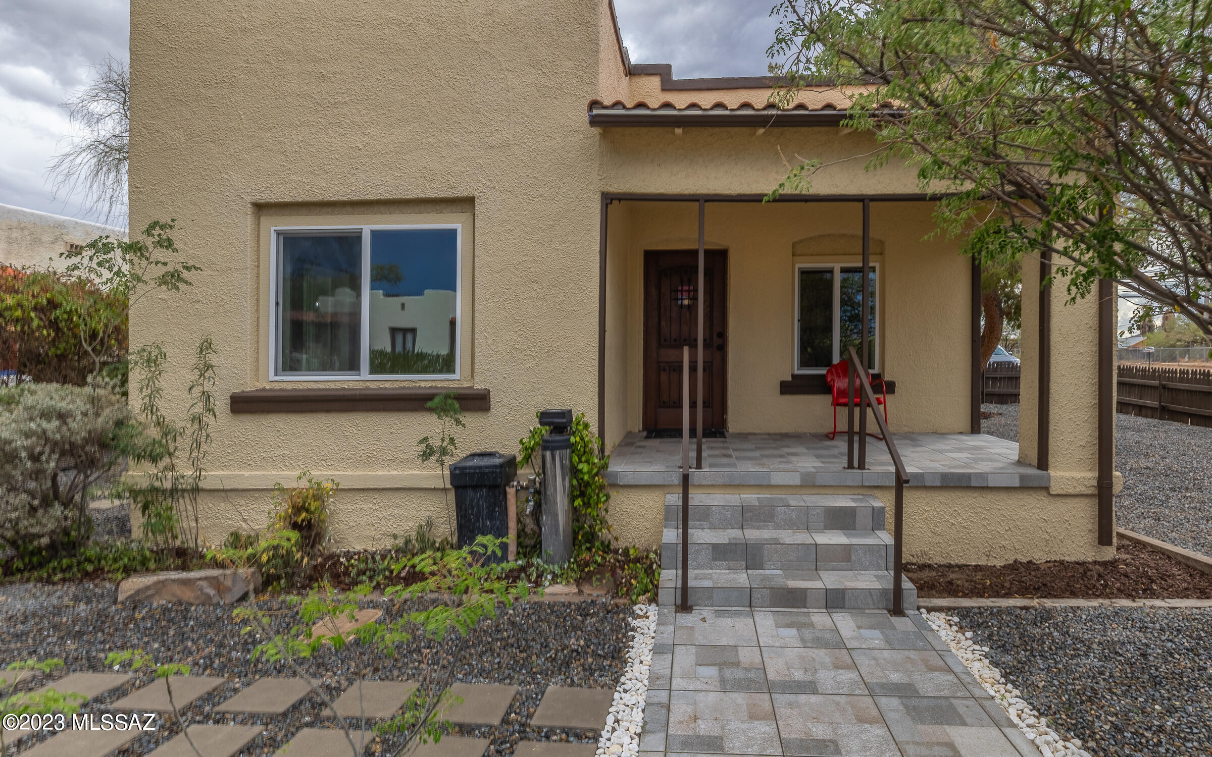 So charming 1944 bungalow features 3 bedrooms and 2 baths with beautiful walk in showers. Seller has meticulously upgraded this lovely home with wood look and tile floors, and a modern kitchen with new stainless appliances and ample cabinets. Both bathrooms have been renovated and are truly a work of art. Well thought out improvements have maintained the charm of this home. Enjoy your morning coffee from the covered rear patio. The back yard oasis is shaded with well established trees, shrubs and is completed gated for privacy and security. This makes for an excellent student house or a unique Air BnB.