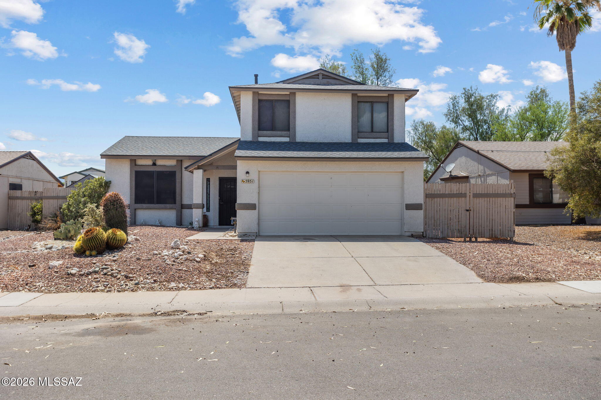 No poly pipes and a new roof in 2024! This move-in-ready 3-bedroom, 2.5-bath home offers 1,660 square feet of comfortable living space with soaring ceilings, abundant natural light, updated flooring, and a cozy fireplace. 

The functional floor plan includes spacious living and dining areas plus a kitchen with ample cabinet and counter space. Upstairs, you'll find generously sized bedrooms, including a private primary suite. 

The backyard is designed for entertaining with artificial turf, an expansive paver patio, fire pit area, and plenty of room for play, pets, and gatherings. Conveniently located near parks, shopping, dining, and schools.