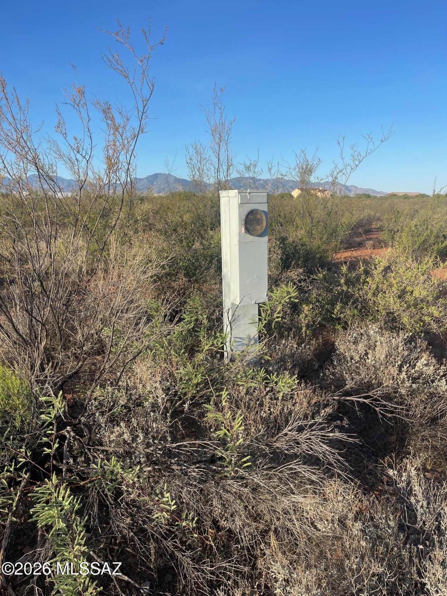 Power and Water, Dividable lot ! Well drilled with power pedestal ready for SSVEC meter. lot is located in San Ignacio Del Babocomari Land Grant area. mostly flat usable, dividable lot, does have a portion on North side which opens into wide drainage with large mesquite Trees.  Has great mountain views, gravel road splits the lot into 2 - 10 ac lots North and South. Selling as single tax parcel. Need to go by and look it over