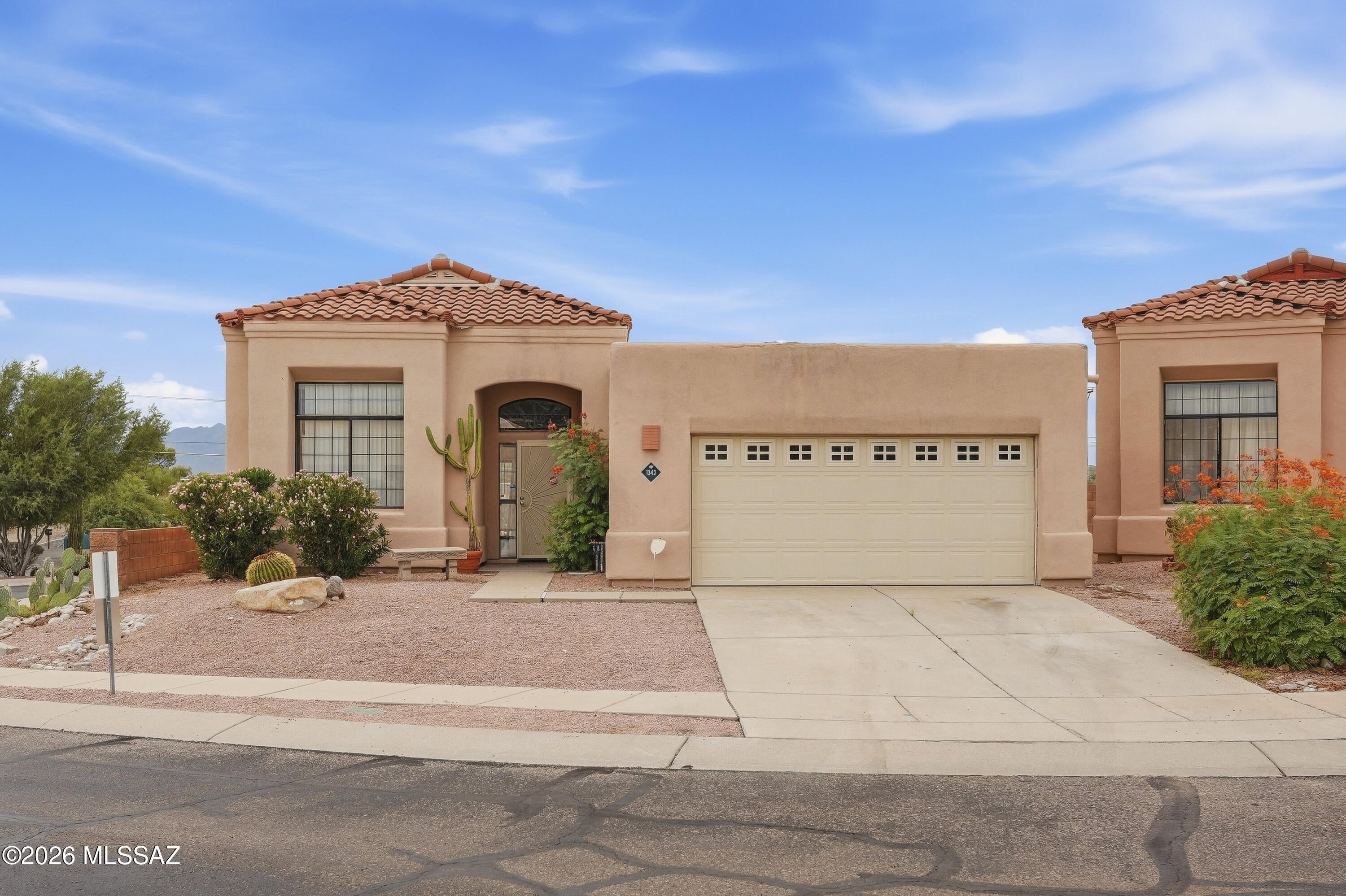 No Application Fees! Spacious single level 3 bedroom, 2 bathroom Tucson home situated on a desirable corner lot. This open floor plan home features laminate flooring throughout with no carpeting, soaring vaulted ceilings, neutral paint, ceiling fans throughout, and abundant natural lighting. The versatile floor plan offers excellent living space with a spacious front living room, formal dining area, and separate family room. The open kitchen features a center island with breakfast bar, separate pantry, all appliances, and ample cabinet and counter space. The oversized primary suite includes a large walk-in closet and private bathroom with a dual sink vanity and spacious step-in shower. Two additional bedrooms provide comfortable living space for family, guests, or a home office. The attached two-car garage provides ample parking and storage space. Easy-to-maintain desert landscaping surrounds the home, while the backyard features a covered patio providing a comfortable outdoor space for relaxing or entertaining.

Convenient Northwest Tucson location close to shopping, restaurants, neighborhood parks, golf courses, outdoor recreation, and major employment centers. Enjoy easy access to River Road, Northwest Medical Center, Tucson Mall, The Loop walking and biking paths, and destinations throughout Central and Northwest Tucson.

All residents are automatically enrolled in the Resident Benefits Package (RBP) for $55.00/month which includes Renter's Liability Insurance, Credit Building to help boost the resident's credit scores with timely rent payments, up to $1M Identity Theft Protection, HVAC air filter delivery (for applicable properties), our best-in-class resident rewards program, and much more!