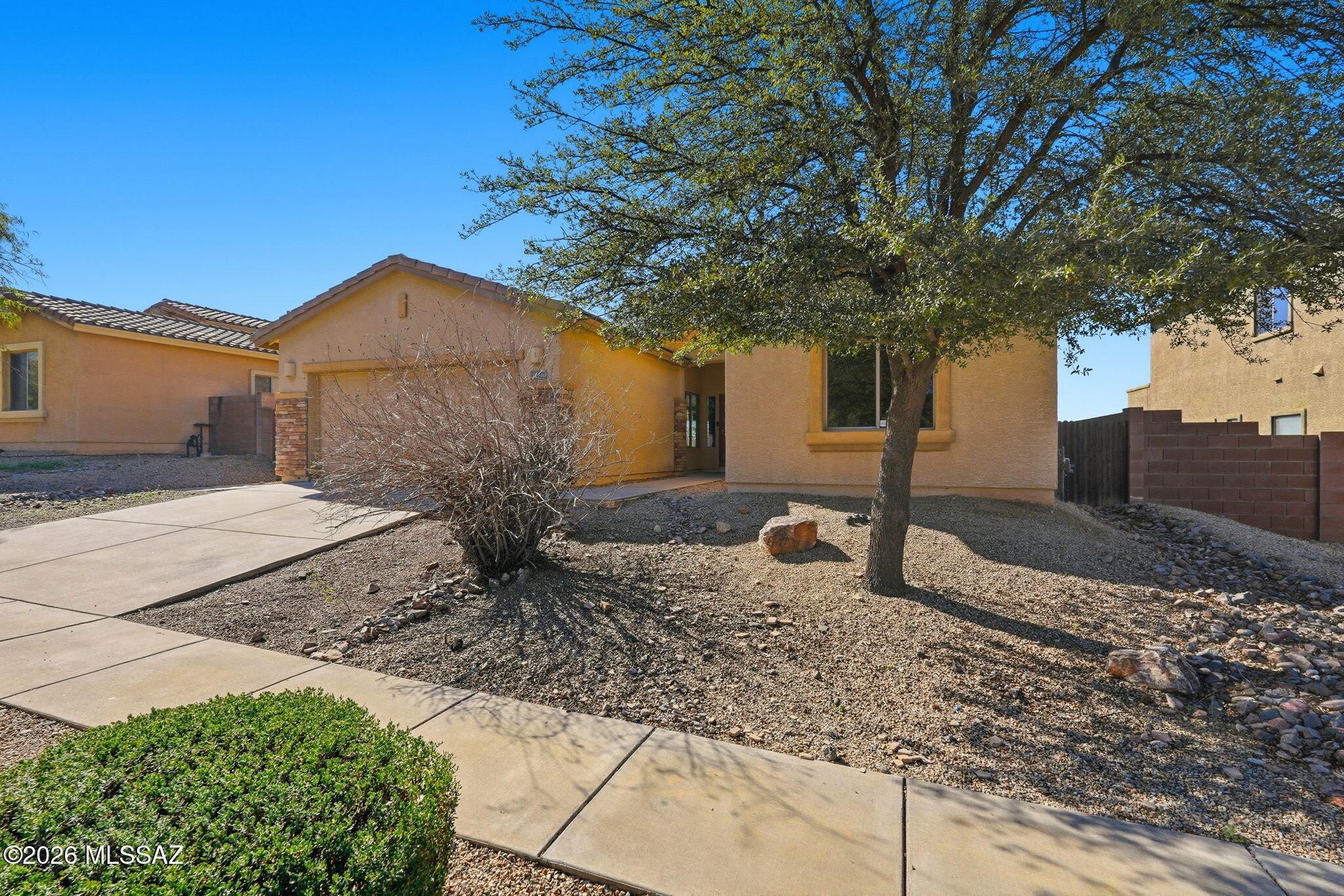 Incredible opportunity in Sycamore Canyon! Desirable perimeter lot backs to natural,/common area w/mountain views . Fresh paint & new carpet. Soaring ceilings, bright, open floor plan designed for comfortable living & entertaining. Spacious great room, formal dining, breakfast nook off the kitchen.
Culinary enthusiasts will love island kitchen featuring granite tile countertops & hickory cabinetry, offering plenty of prep & storage space. Primary suite is a relaxing retreat w/double vanity, separate shower & soaking tub. Laundry room w/ both gas & electric dryer hookups for added flexibility. Tandem 3-car garage offers ample room for vehicles, storage, or hobbies. Community amenities include pool/spa, park, playground & scenic walking paths. BBQ, spa hookup & water softener convey as-is.