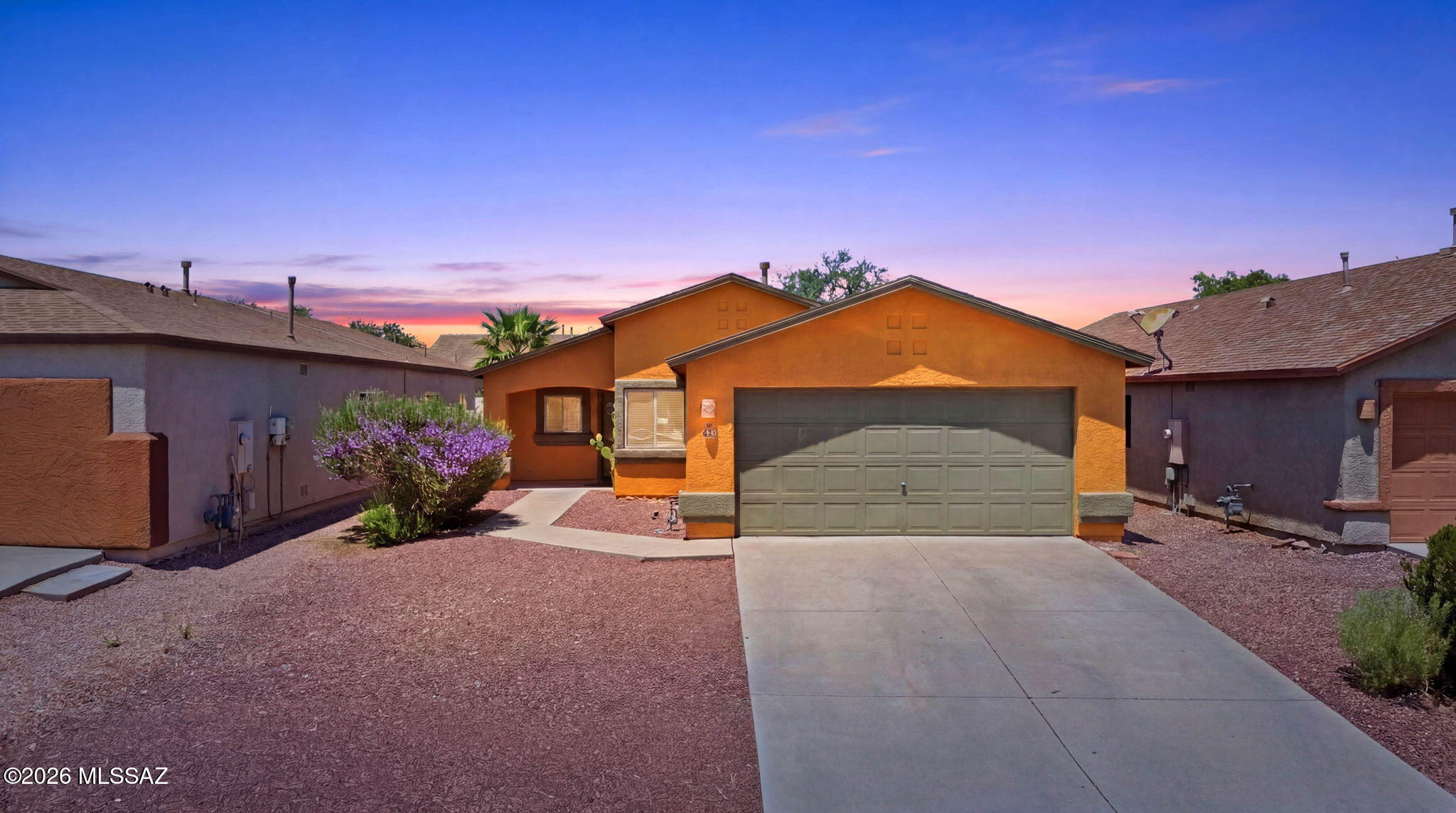 *VA ASSUMABLE* Your opportunity to enjoy life in the highly sought after Rita Ranch community and award-winning Vail Unified School District. 
Tile flooring throughout provides style and easy maintenance, while the kitchen features tasteful black cabinetry paired with a stainless steel Insignia refrigerator for a modern touch.
Step outside to a low-maintenance backyard complete with a covered west-facing patio where you can unwind while taking in the sunsets. 
Relaxing or entertaining, this outdoor space is ready to enjoy. 
Additional updates include a 2021 A/C unit for added peace of mind. The home is also pre-wired with an ADT security system, with equipment already installed for easy activation if desired.
Conveniently located just minutes from shopping, dining, parks, and I-10 acc