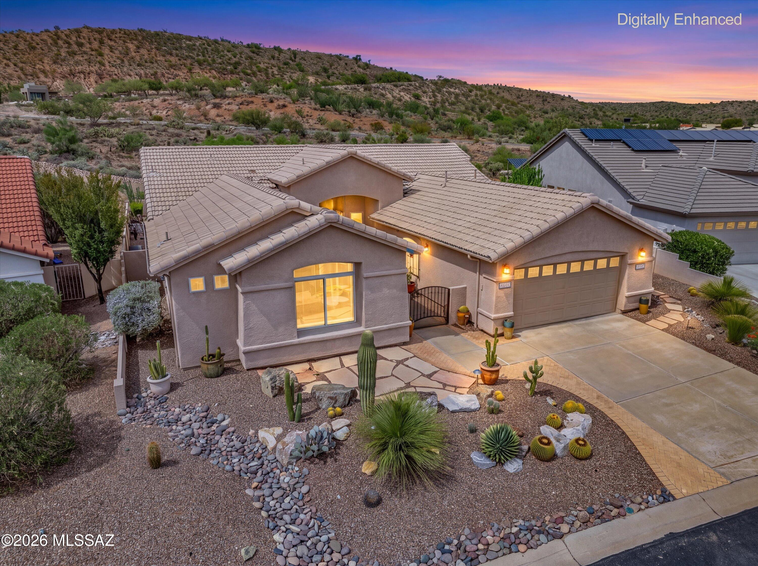 Ponderosa Model with Casita in SaddleBrooke Very well-maintained Ponderosa model with a casita, ideally located in SaddleBrooke, Arizona's premier active adult community. This spacious home features 3 bedrooms, 3 full bathrooms, tile flooring throughout, designer interior paint tones, large windows, and a bright, open-concept floor plan. The spacious kitchen offers a generous island and abundant storage, while 2x6 construction provides added peace of mind. Step outside to your private backyard oasis, beautifully landscaped and designed for both relaxation and entertaining. An extended patio provides plenty of room for gatherings, while the screened-in Arizona room offers additional privacy and a comfortable space to enjoy the tranquil surroundings. With no homes directly behind, the backyard feels especially private with views of the Condones  vistas. The welcoming front yard offers wonderful curb appeal, a charming seating area, and beautiful mountain views. For added peace of mind, a full home inspection has been completed by House & Home, with inspections also performed by MAV Roofing and Twin Lakes Air. See the Seller's Disclosure for additional details. This inviting property offers the perfect blend of comfort, privacy, and thoughtful design in the sought-after SaddleBrooke lifestyle.