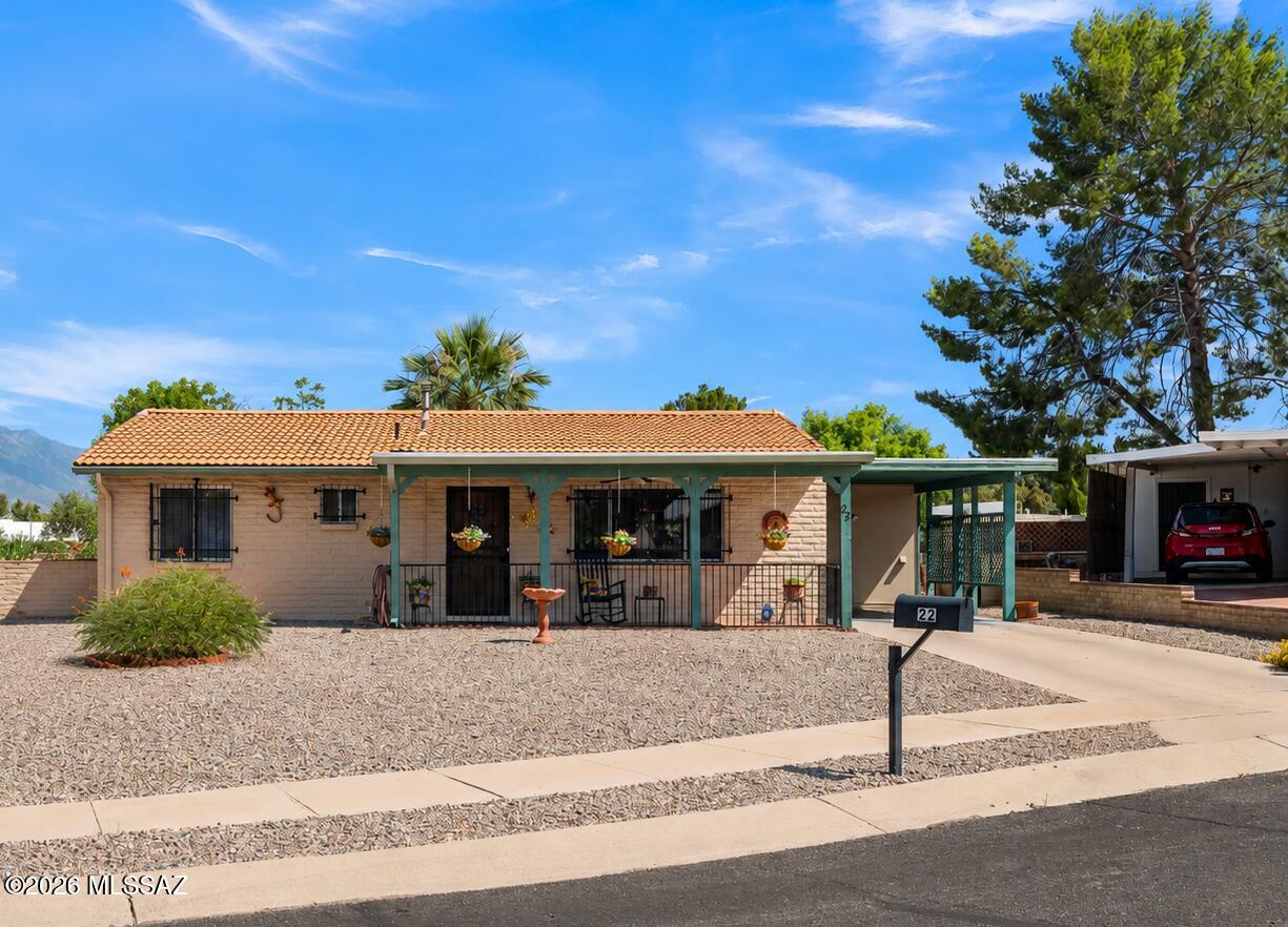 Discover timeless Southwest charm in this classic Arizona Territorial home nestled on a large cul-de-sac parcel. Offering 2 BR, 2 Baths and a light filled Arizona Room with easy care ceramic tile flooring throughout. Kitchen has been tastefully updated with new cabinets, stainless appliances and colorful backsplash. The spacious Arizona room adds an extra living space and adjoins the workshop/storage area/laundry. Major updates include a new roof (2022), gutters & downspouts (2023) and new HVAC system (2024), providing peace of mind and comfortable living for years to come. Located around the corner from Desert Meadows Park and nea rby to several GVR centers. Open House Tuesday 6/16 10-Noon