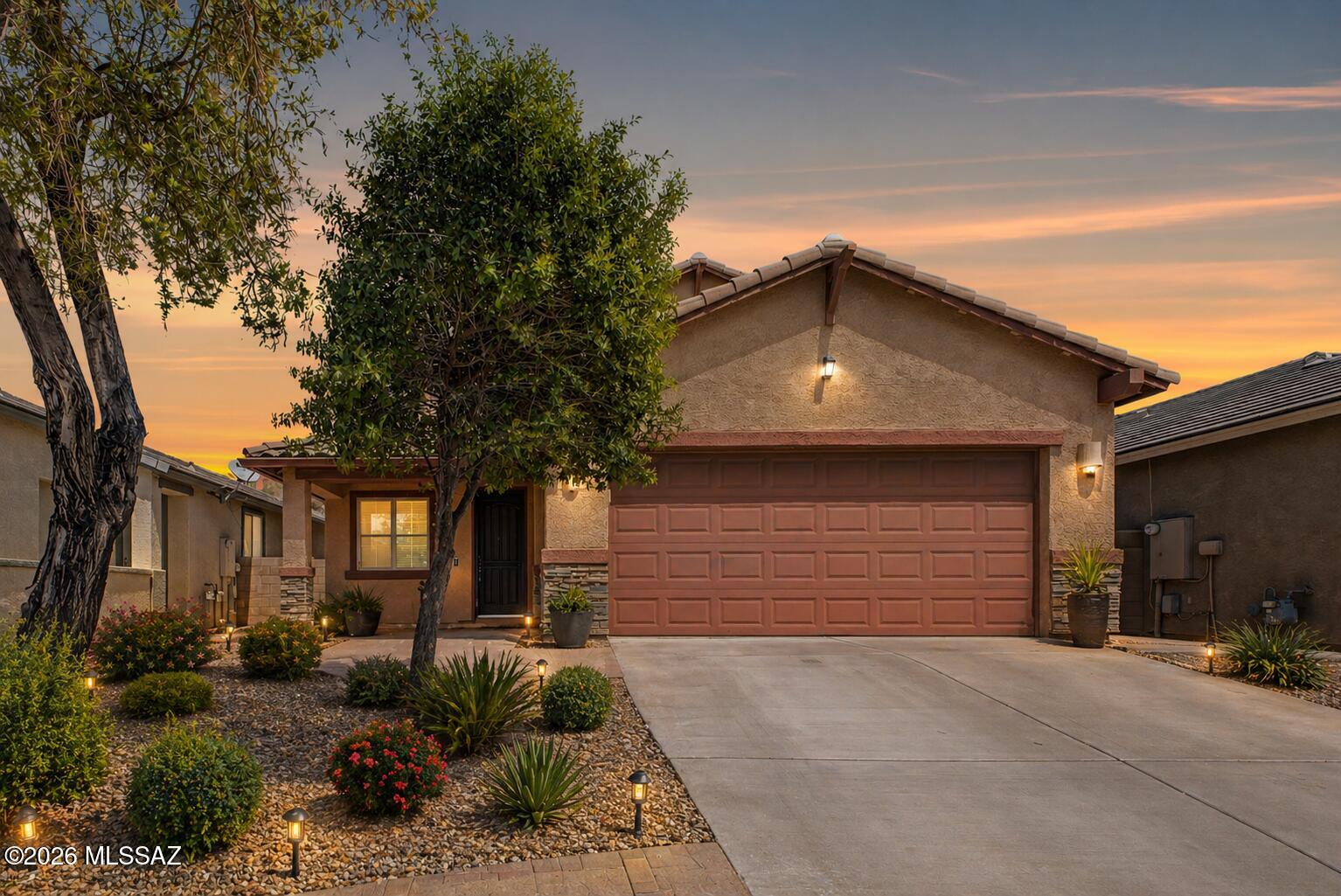 Tucked away at the end of a quiet cul-de-sac of The Rancho Del Lago community, this beautifully maintained two-story home in Vail offers the perfect blend of comfort, flexibility, and modern style.  Spacious 4-bedroom, 4-bath layout spans over 2,200 square feet and is designed for both everyday modern living and effortless entertaining. 

One of the standout features is the RARE NEXTGEN Model with private guest suite with its own separate entrance--complete with a bedroom, living space, and kitchenette. Whether you're hosting extended family, accommodating guests, or exploring rental potential, this space offers incredible versatility. 

Step inside to a bright, open-concept great room where natural light fills the space, creating a welcoming atmosphere you'll love coming home to. The kitchen seamlessly connects to the dining and living areas, making it easy to host gatherings or enjoy relaxed evenings in. 
With a thoughtful mix of tile and carpet flooring, plus year-round comfort from central air and heating, this home checks all the boxes.

Outside, the low-maintenance desert landscaping keeps things simple while still providing a peaceful setting. With no rear neighbors, the backyard is ideal for relaxing under the covered patio or taking in the surrounding mountain views--your own private retreat at the end of the day.

Additional highlights include a two-car garage, ample parking, and a well-kept community with low HOA fees. Enjoy access to community amenities, including a pool, playground, and basketball court. Plus, you're just minutes from highly rated schools, parks, and everything Vail has to offer.

This home truly combines space, function, and flexibility in a desirable location--ready for you to move in and make it your own.