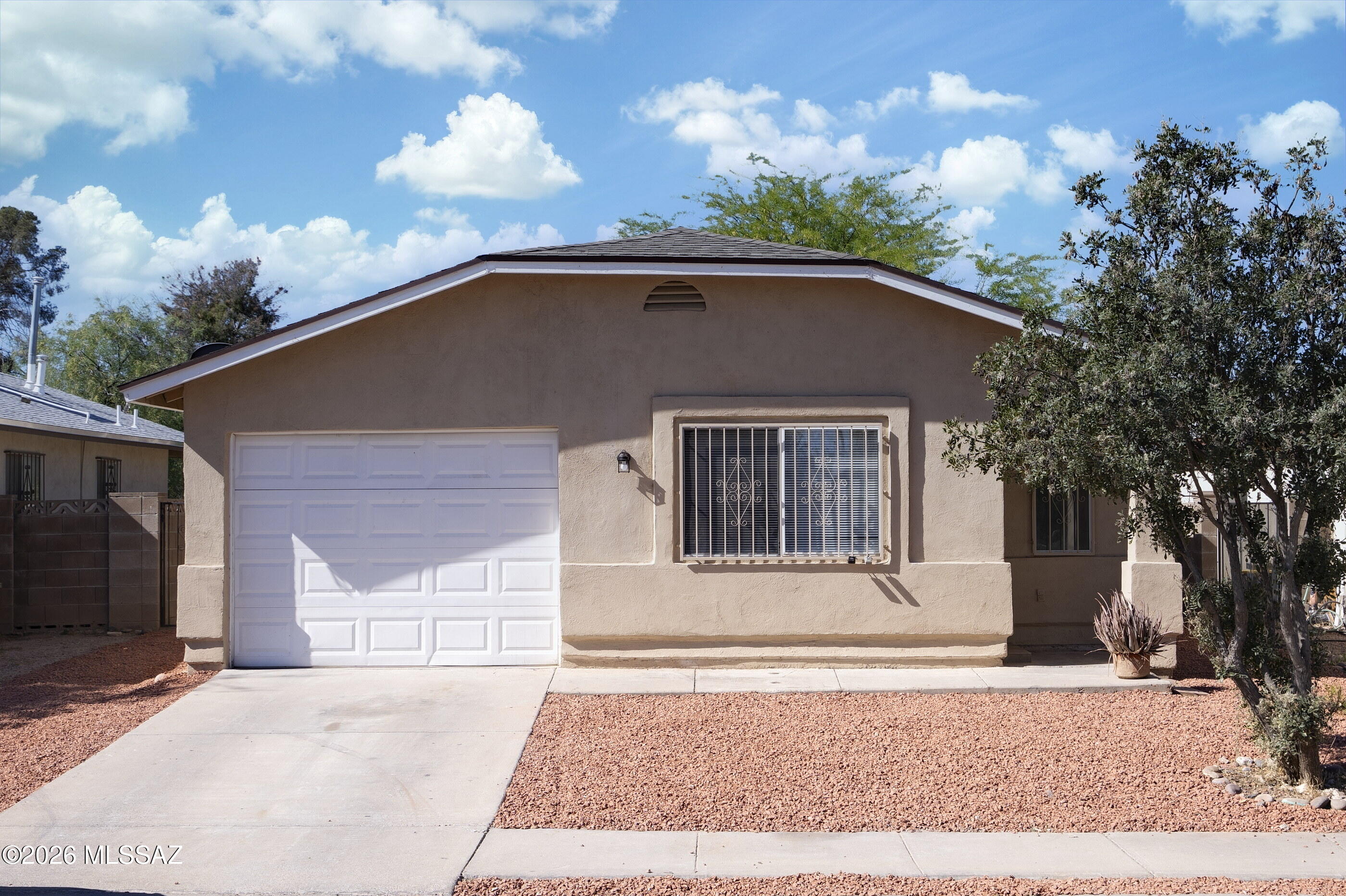 Affordable 3 bedroom/2bath, with BRAND NEW ROOF - and BRAND NEW HVAC !  Move in condition.  NEWER GAS RANGE, NEW DISHWASHER.  Freshly painted interior.  Large fenced backyard w/large covered patio.  1 car garage.  Convenient to airport, DMAFB, shopping, I-10 & schools.  A must see - priced to sell.