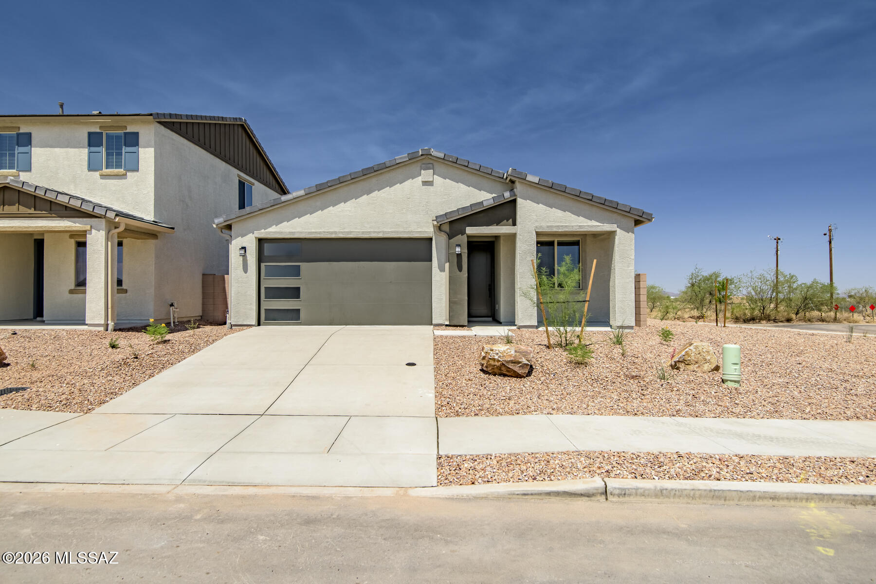The Bisbee by LGI Homes at Star Valley is the perfect place to call home. This beautifully upgraded, single-story home features an open-concept layout with 3 bedrooms, 2 bathrooms, and a 2-car garage. Thoughtfully designed to enhance everyday living, the Bisbee offers soaring 10-foot ceilings, a spacious family room, and a dedicated dining area for gathering with loved ones. The chef-ready kitchen is a true highlight, showcasing a large island, beautiful quartz countertops, and a full suite of energy-efficient Whirlpool® appliances, all included with the LGI's CompleteHome Plus™ package. From morning coffee to quiet evenings on the private back patio, this home offers comfort, convenience, and charm at every turn.