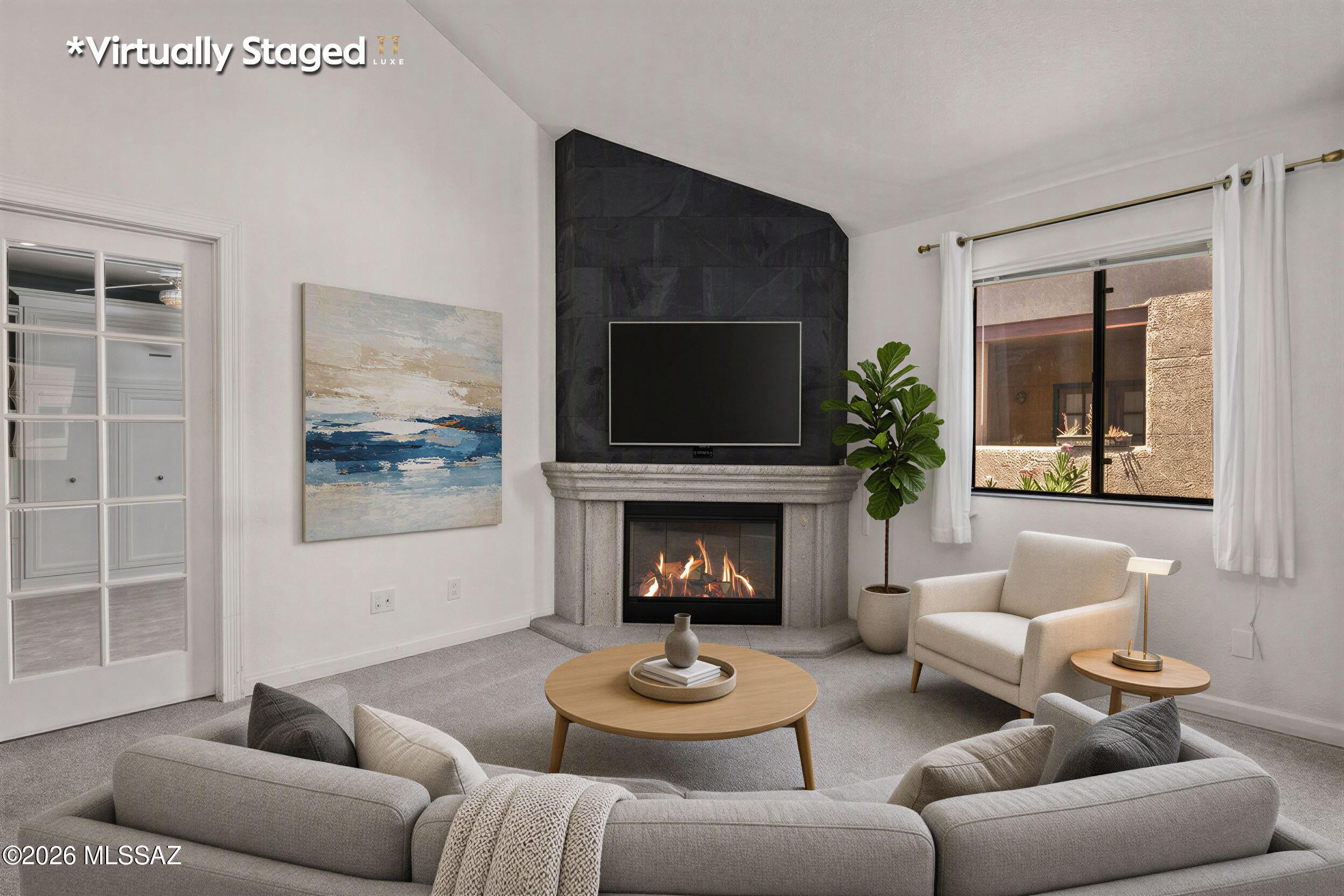 What looks like a charming Tucson condo quickly reveals something more--style, flexibility, and thoughtful upgrades designed for easy living. Vaulted ceilings and a dramatic fireplace create an inviting first impression, while the Murphy bed transforms the space to fit your lifestyle. Recent upgrades include new central A/C, a new tankless water heater, new dishwasher, a dryer with steam setting, and a renovated shower with a high-pressure shower head and changeable filters. Enjoy the community pool and a central Tucson location near The Loop, Rillito River path, dining, shopping, the University of Arizona, downtown, and the Catalina Foothills. There's more here than meets the eye--call your agent, schedule a showing, and experience it for yourself.