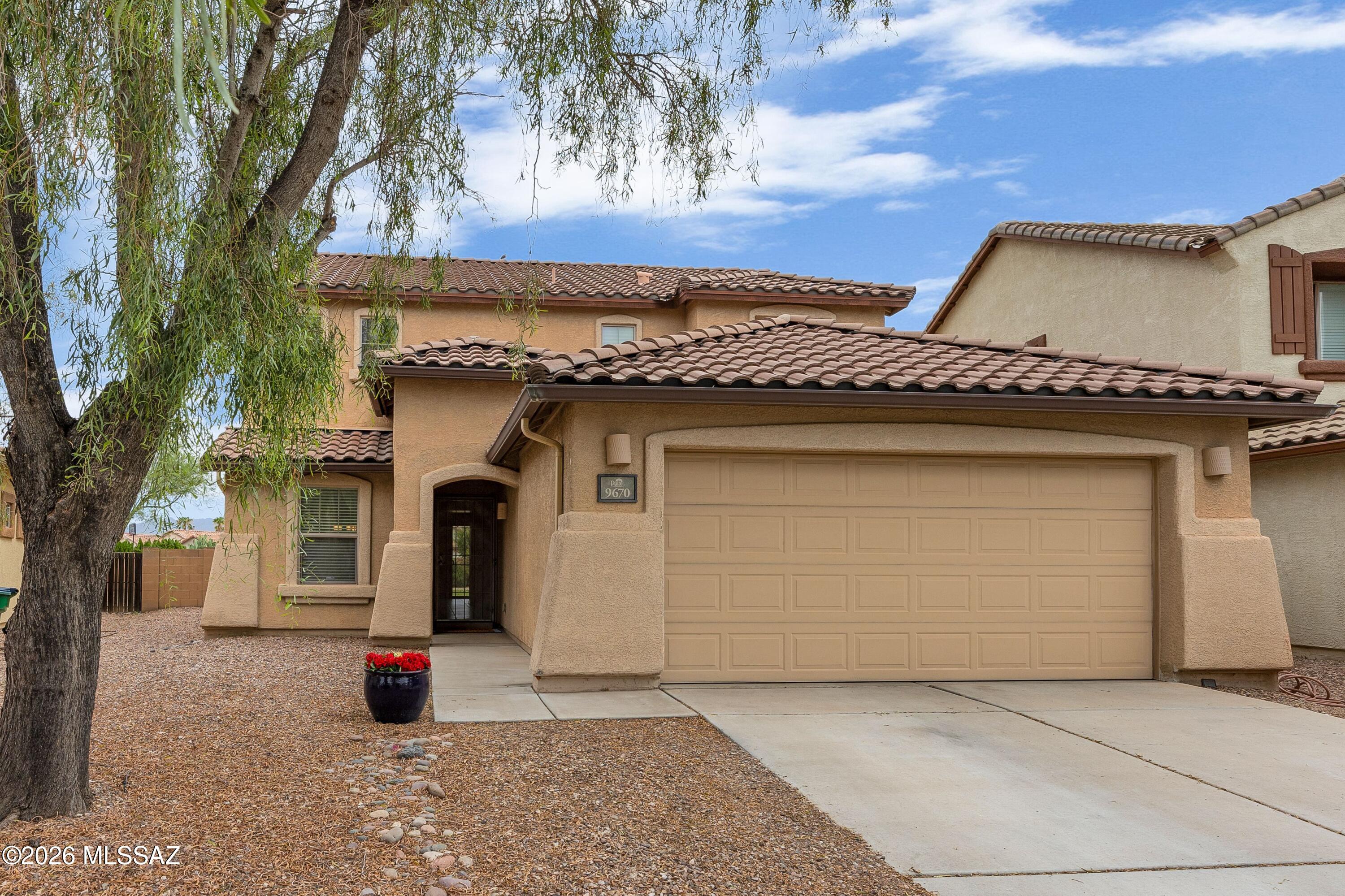 LOWER YOUR MONTHLY PAYMENT! Seller Offering $5,000 Toward Buyer Closing Costs or Interest-Rate Buy-Down w/ Acceptable Offer! Boasting an exceptional architectural design, this energy-certified Pulte home offers premium comfort within Marana's premier Continental Ranch community. The main level introduces an open concept great room, pairing an island kitchen with a welcoming family area. Elegant separate living and dining rooms provide the ultimate backdrop for sophisticated entertaining, while a coveted main-floor bedroom serves as an ideal executive office or guest suite. The upper level hosts three spacious bedrooms and an expansive loft, a flexible sanctuary perfect for a secondary lounge or creative studio. The true showstopper is the backyard retreat, masterfully designed for entertaining with vibrant green turf and built-in outdoor BBQ. Beyond your private gate, embrace resort style living with access to scenic parks, pristine pools, spa, and tennis courts.