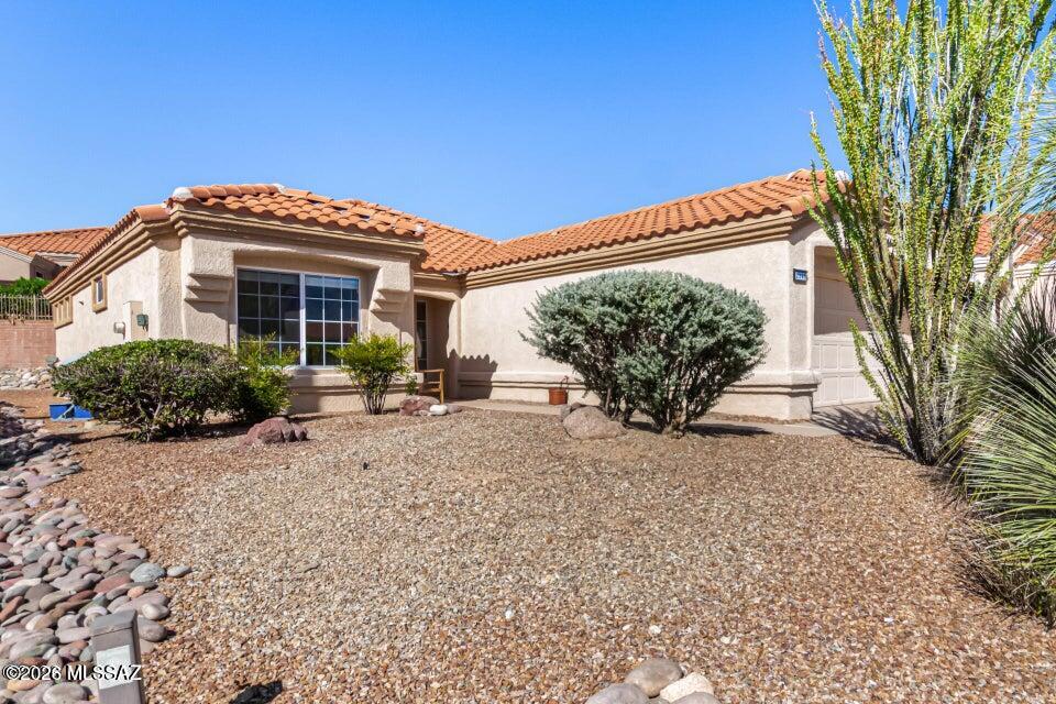 Light and bright Mariposa split bedroom model has a covered rear patio and nicely landscaped yard. The kitchen includes stainless steel appliances, farm house sink, pantry, breakfast bar and nook. The spacious family room has high ceilings and lots of natural light. The laundry room has cabinets and utility sink. The bedrooms have new flooring & the owners suite boats walk-in shower & walk-in closet. Lifestyle amenities include: aquatic & fitness center, artisan center, bocce courts, gift shop, the views golf club, pickle and tennis courts, restaurant, mini golf and activity center.