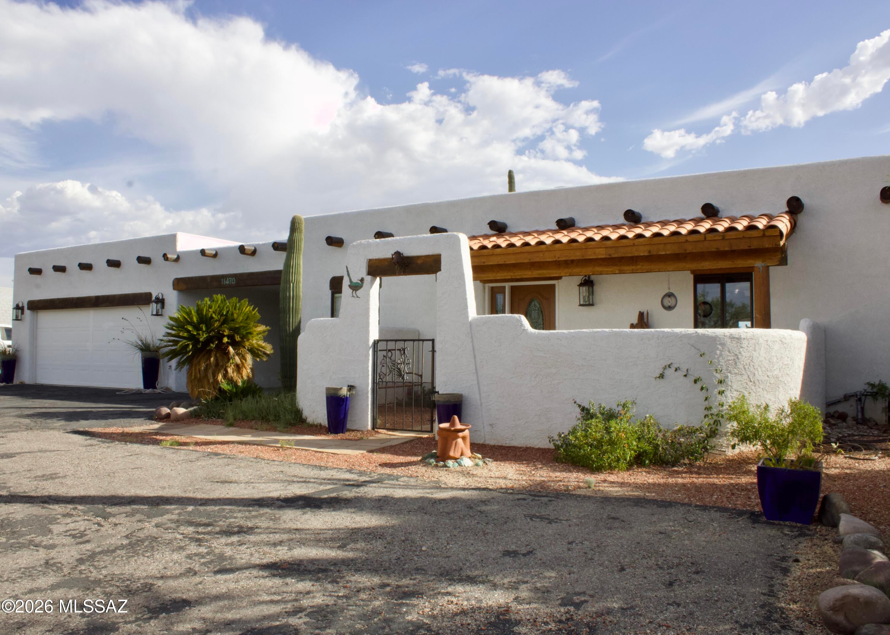 Come home to your own desert paradise! Enjoy quiet, country living w/all the in-town amenities close by. Lots of privacy. Stunning mountain views. Quick access to I-10 for commuting. Bring the horses! Charming, comfortable & meticulously maintained Southwestern custom home. 1,773 sq. ft. 3 bed/2 ba w/375 sq. ft guest rm/storage rm.  Custom touches throughout. Great room opens to the covered patio where you will enjoy relaxing & taking in all of the fabulous views. Great home for entertaining & just enjoying your peaceful surroundings. Cool off & relax in the sparkling custom pool. Built in gas BBQ. Large backyard. Insulated 24' x 30' 2 car garage w/workbench. 1 car carport.  This really is a MUST-SEE property! Schedule a showing TODAY, as this one is not going to last long!