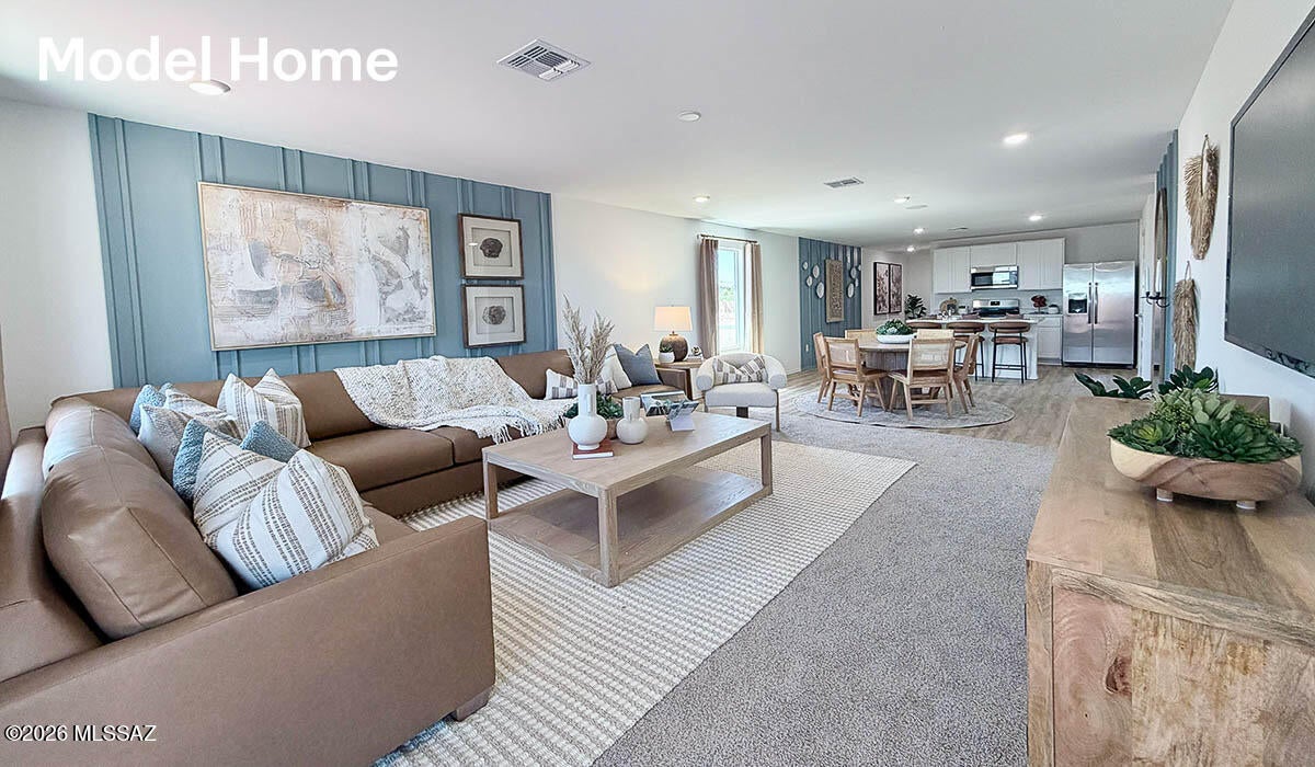 Welcome to The Ember at Sorrel Ridge Estates by D.R. Horton in Southwest Tucson, AZ. This thoughtfully designed 1,621 sq. ft. single-story home blends style, comfort, and functionality--ideal for first-time buyers or those seeking room to grow. The open-concept layout connects the great room, dining area, and kitchen for effortless entertaining. Enjoy four bedrooms, including a spacious primary suite with walk-in closet and en-suite bath. A central laundry room, smart home features, and ample storage add convenience. Step outside to a backyard with mountain views and stunning sunsets. Sorrel Ridge Estates offers walking trails, a playground, dog park, and easy access to major employers and Tucson International Airport.