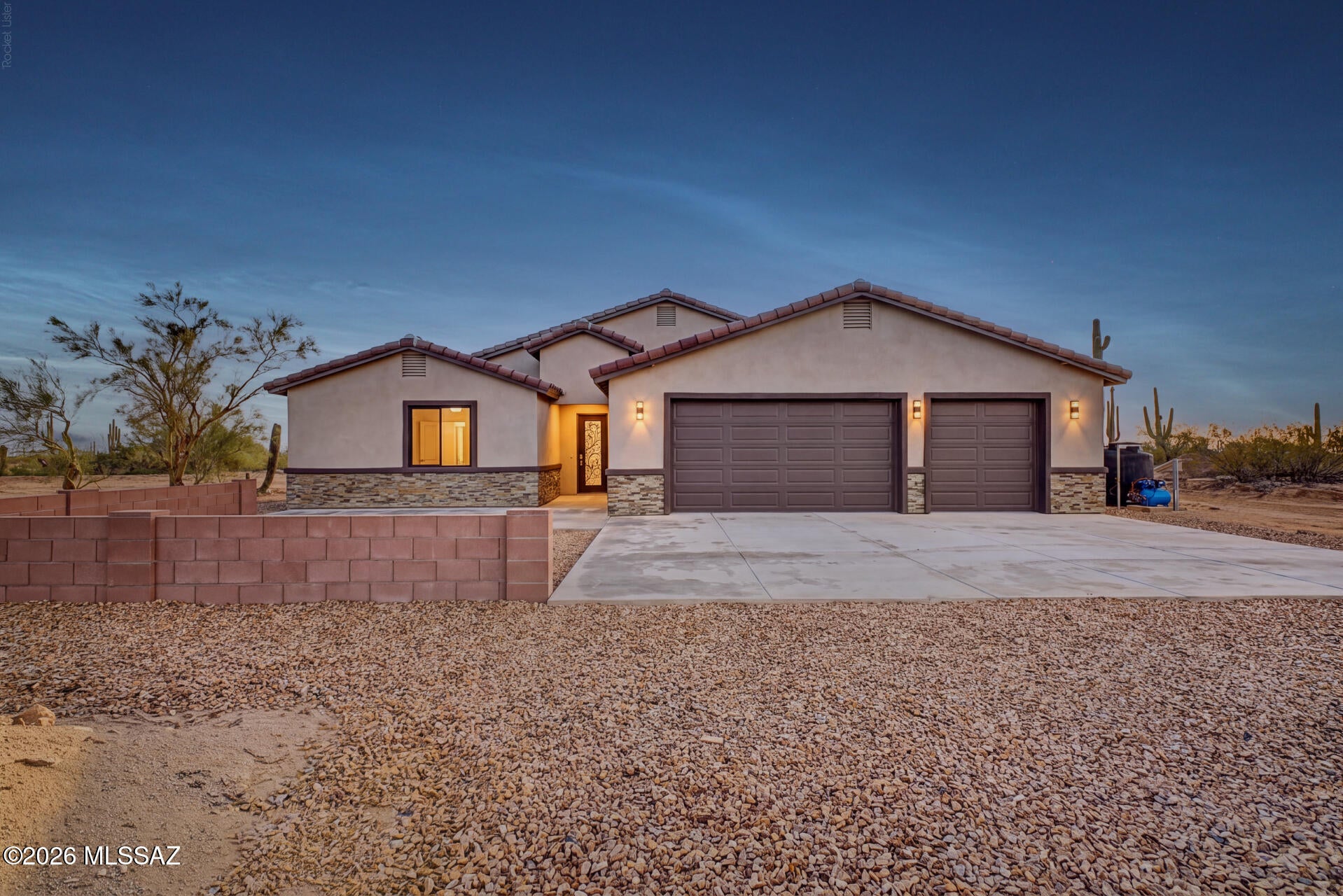 **SELLER FINANCING INCENTIVE! SELLER OFFERING UP TO $10K IN CONCESSIONS! With preferred lender, use toward an interest rate buydown or up to 3 months of prepaid mortgage payments! See documents tab for lender incentive!

Experience the beauty and tranquility of the Sonoran Desert with this exceptional new construction home situated on 1.49 acres in Marana. Surrounded by majestic saguaros, stunning mountain views, and breathtaking desert landscapes, this private and secluded property offers a peaceful retreat while still being conveniently located near everyday amenities.
Boasting 2,590 square feet of thoughtfully designed living space, this quality-built home features durable 2x6 construction, soaring ceilings, and an open, airy floor plan filled with modern finishes. The spacious layout includes four generously sized bedrooms, three full bathrooms, and a convenient half bath. The chef's kitchen is designed to impress with quartz countertops, upgraded cabinetry, a huge walk-in pantry, and abundant workspace for cooking and entertaining. Beautiful marble-look ceramic tile flooring flows throughout the home, creating a sophisticated and cohesive feel.
The luxurious primary suite and spacious secondary bedrooms offer large walk-in closets and comfortable living spaces for family and guests. Outside, the property is beautifully finished with block walls, premium turf, and decorative rock landscaping, creating an attractive and low-maintenance outdoor environment.
For those needing extra space, this property truly stands out. With nearly 1.5 acres, there is plenty of room for RVs, boats, trailers, and all your recreational toys. The expansive lot also offers ample space to add a detached garage, workshop, RV garage, guest house, or additional storage structures to fit your lifestyle. An oversized extended-length three-car (25'X34') garage provides even more room for vehicles and equipment.
Combining luxury finishes, quality construction, incredible privacy, and endless possibilities, this remarkable Marana property delivers the very best of Arizona desert living.