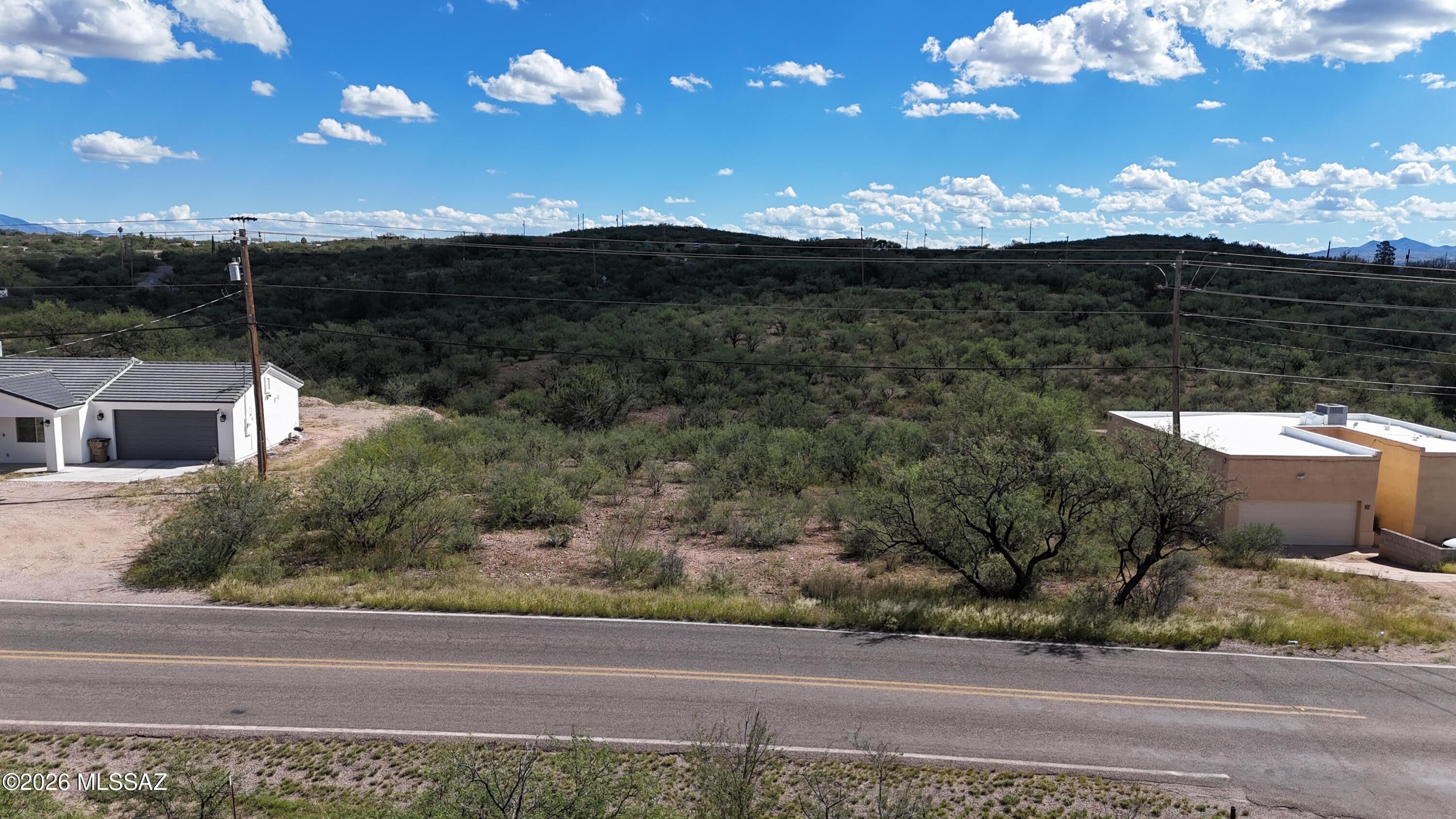 Residential lot on Paseo Mexico, all paved access, electric and water is along Paseo Mexico.  Only about 4 to 5 minutes from the shopping center and highway entrance.