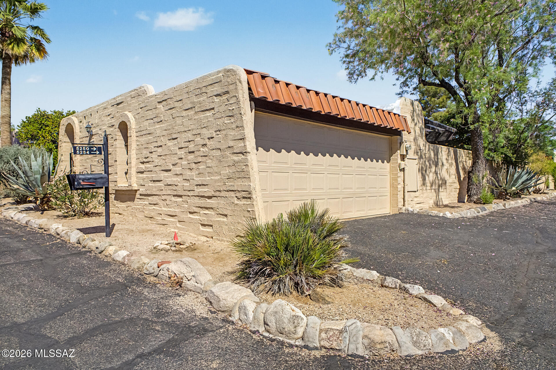 BEAUTIFULLY UPDATED townhome in Pueblo Villas, ready to move in! Situated on a desirable corner lot, this home offers 3 bedrooms, 2 bathrooms, and 2 carport spaces. The inviting interior showcases clean, modern lines enhanced by a fresh neutral palette, new interior and exterior paint, new baseboards, new ceiling fans and lighting fixtures, and abundant natural light throughout. Enjoy brand-new wood-look flooring that flows seamlessly through the home. The completely updated kitchen features new stainless steel appliances, quartz countertops, designer tile backsplash, recessed lighting, and new white shaker cabinetry. Additional upgrades include a new hot water heater, new doors to the outside storage unit, and extensive improvements throughout. The spacious main bedroom offers outdoor access and a walk-in closet. Both bathrooms have been beautifully refreshed with new tile, new toilets, and updated cabinetry and fixtures.
Step outside to a private backyard retreat complete with a covered patio, pavers, fruit tree, and direct access to the carport. Major exterior upgrades include a new triple-coat roof on both the main house and garage, along with new clear patio panels.

PLUS! Residents of Pueblo Villas have access to a community pool, relaxing spa, and a welcoming clubhouse, perfect for leisure & social gatherings. The neighborhood features well-maintained common areas with HOA-covered upkeep, along with paved, lighted streets that enhance everyday comfort. Its convenient location near Oracle Road places shopping, dining, and outdoor recreation just minutes away. Don't miss this opportunity!