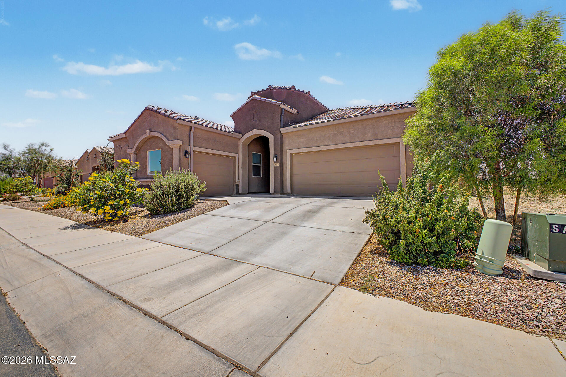 The search is finally over! This beautiful 4-bedroom 3 bath with a den residence called the Savannah, welcomes you with charming curb appeal, a 3-car garage, and mature front landscaping. Inside, you'll love the spacious open layout featuring soaring ceilings, recessed lighting, blinds throughout, and attractive ceramic tile flooring. The gourmet kitchen is designed to impress with granite countertops, chic pendant lighting, crisp white cabinetry with crown moulding, stainless steel appliances, a walk-in pantry, and a large island with a breakfast bar perfect for casual dining and entertaining. Energy-Savings Included! This home comes equipped with a solar system designed to help lock in lower energy costs. Buyers will assume the existing solar lease, offering predictable monthly payments while helping avoid rising utility rates. 
A versatile den provides the ideal space for a home office, study, or flex room. The spacious primary suite offers plush carpeting, a private ensuite with dual sinks, and a walk-in closet. Step outside to an inviting backyard designed for relaxing and entertaining, complete with a covered patio, paver seating area, and a gazebo perfect for dining al fresco. This incredible home is ready for its next owner!