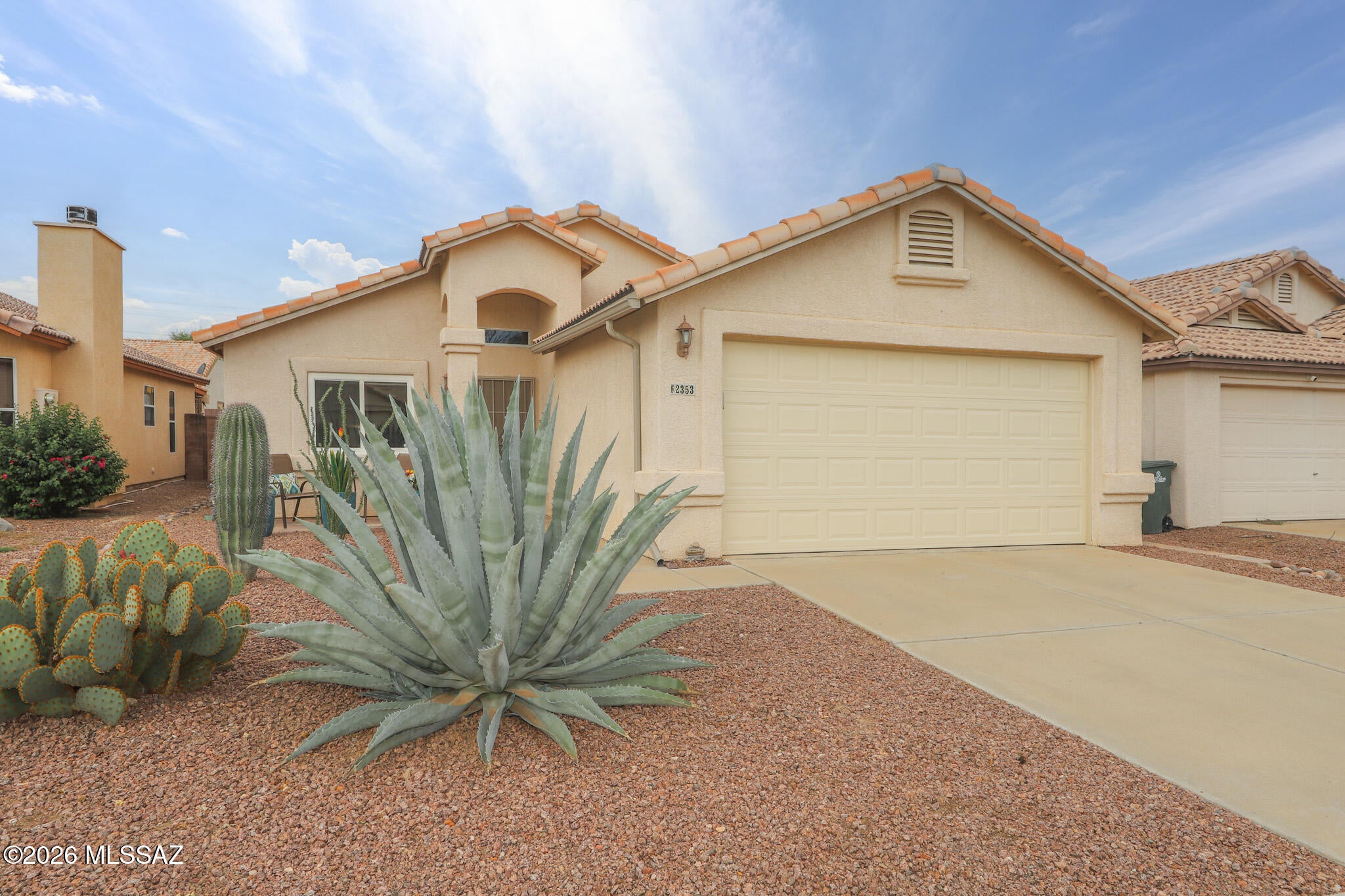 Step into your own Westside oasis! Bright, impeccably maintained, & thoughtfully updated, this inviting home combines modern comfort with the laid-back lifestyle Tucson is known for. Beautifully renovated in 2021 & barely lived in, this pristine home is fresh, clean, & truly move-in ready! Fantastic opportunity for investors seeking a short-term rental property, or individuals looking for a beautifully updated, low maintenance home!
Inside, abundant natural light, soft neutral finishes, and durable LVP flooring create a warm, welcoming atmosphere. The updated kitchen features crisp cabinetry, stainless steel appliances, and a decorative tile backsplash, while the open living and dining areas make everyday living and entertaining feel effortless. The spacious primary bedroom comfortably accommodates a king-size bed and includes a walk-in closet. A flexible second room gives you options for a bedroom or home officeThe updated bathroom features a double vanity and designer touches. New energy-efficient windows, water heater, washer and dryer, and garage door and opener add comfort and efficiency.
The home also offers convenient smart-home features including a Wi-Fi thermostat, front-door keypad, garage keypad, and Ring doorbell camera.

The private backyard offers a generous desert-landscaped retreat with a covered brick patio--perfect for morning coffee, weekend barbecues, or relaxing beneath Tucson's beautiful skies. The front stone patio provides another charming spot to enjoy the sunrise and mountain views. 
Nestled in a quiet neighborhood with sidewalks, a shaded playground, basketball court, and direct access to The Loop. The neighborhood also borders Pima County's new Meander Bend Park, with trails winding through native desert vegetation. Downtown Tucson, the University of Arizona, the Mercado District, St. Mary's Hospital, and Gates Pass are all approximately 10-15 minutes away. This special home is also conveniently located to I-10, shopping, dining, parks, hiking and biking trails, golf, and many of Tucson's best destinations!
Beautifully updated. Easy to maintain. Perfectly located. Come see why this West side Oasis is a place you'll want to call home!