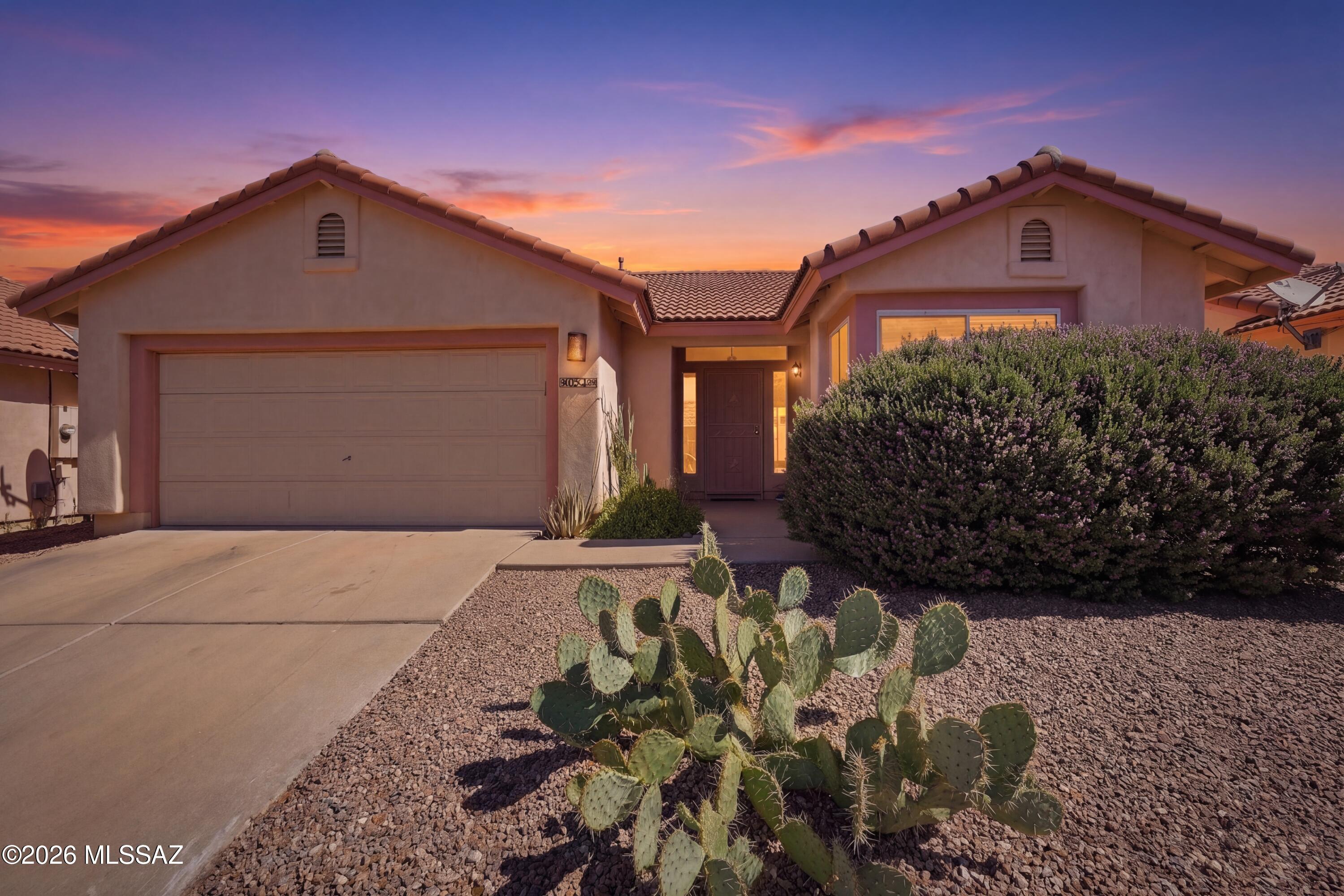 Step into comfort and style in this beautifully maintained 3BR/2BA home in the desirable North Ranch community. Soaring vaulted ceilings and a light-filled open floor plan create an inviting feel throughout. The functional kitchen offers ample cabinetry, generous counter space, a new electric range, and a gas line for future conversion. Enjoy peace of mind with a new HVAC system, no Polybutylene pipes, and dual-pane windows. The primary suite features a dual vanity bath and direct backyard access. Additional highlights include ceiling fans throughout and a dedicated laundry room. Resort-style amenities include pools, tennis courts, basketball court, and scenic jogging trails. Located in northwest Tucson close to shopping and dining. Seller offering a 1-year home warranty with Assurant.