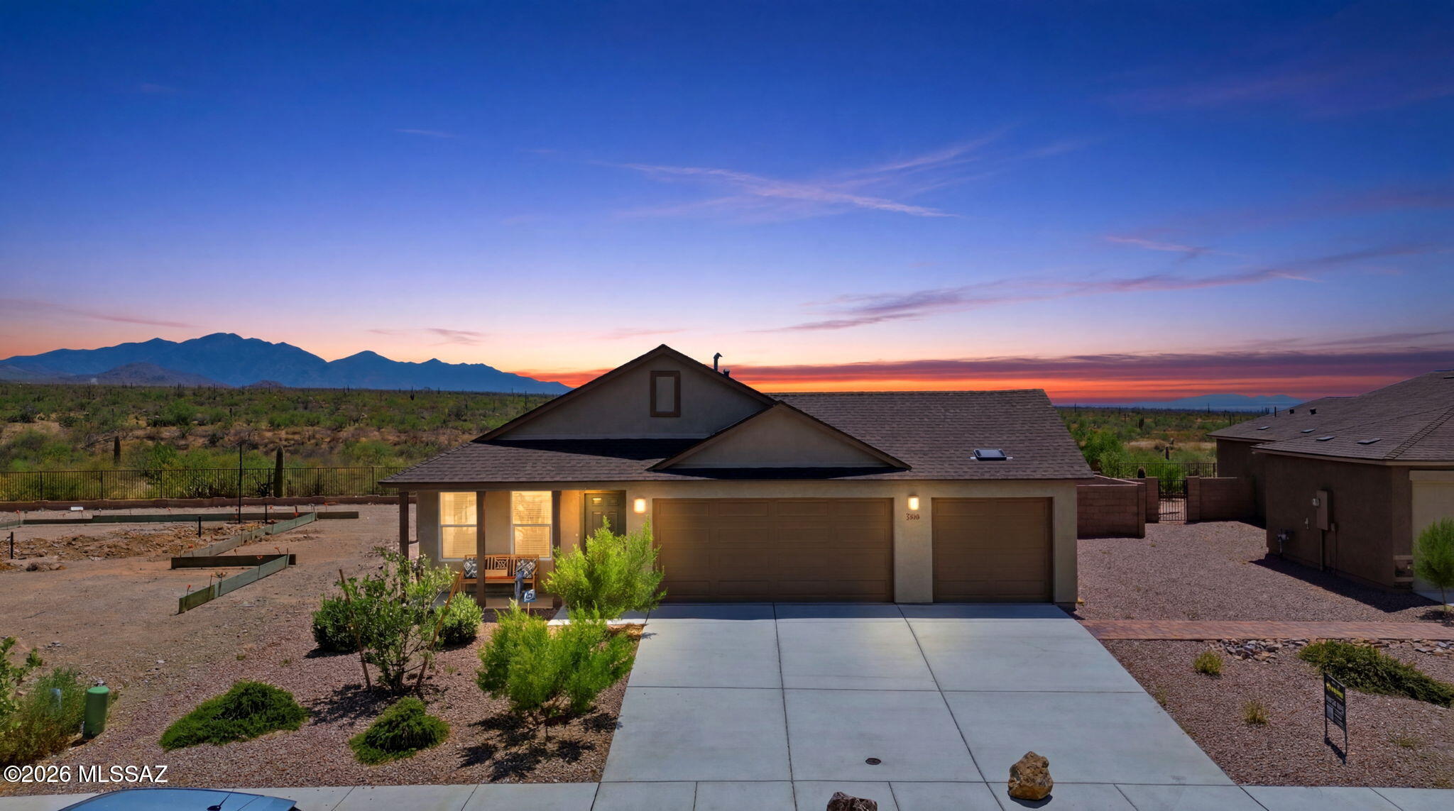Positioned in the heart of fast-growing Vail, Arizona, this never-occupied 2024 model home offers the perfect combination of pristine new construction and premium location. Boasting 3 bedrooms and 2 bathrooms, this residence is situated on a highly desirable lot with no rear neighbors, providing unobstructed front-row seats to world-class Southern Arizona sunsets and spectacular views of the Santa Rita Mountains. Location is unmatched for families, with Copper Ridge Elementary School located just a couple of blocks away within Vail's highly acclaimed, award-winning school district. Inside, the home features a light and bright open living space designed with modern style and comfort in mind. The beautifully appointed kitchen showcases tasteful design choices, including rich granite countertops, matching stainless steel appliances, and a seamless flow for entertaining. Both bathrooms are finished with stylish, contemporary fixtures. The outdoor living space has already been fully landscaped for you, saving you time and money. Enjoy a low-maintenance desert oasis featuring premium pavers, lush artificial turf, and clean decorative rock--the ultimate backdrop for relaxing on warm desert evenings. Experience the very best of Southern Arizona living in a home that feels brand new because it is.
All staged items will be removed before closing.