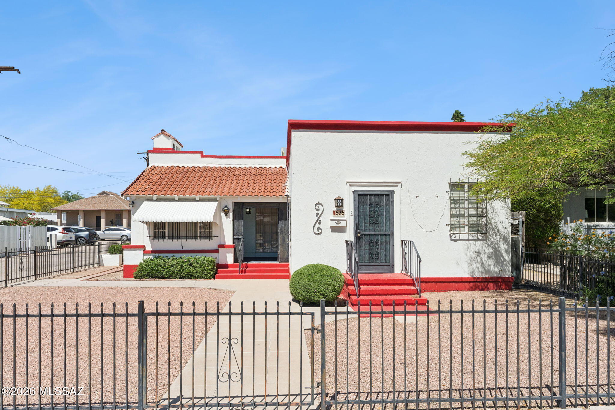 Extraordinary location on the Tucson Streetcar line less than one block from the 3rd Avenue station on beautiful University Boulevard, 5 blocks from UA Main Gate. Large house currently setup as two units: main house with 2 large bedrooms each with walk-in closet and full bath, second unit with bedroom, bath, and kitchen. Carport and garage! Please do NOT disturb tenant in Unit #2. Owner / agent, willing to finance for entity investor: 10% down, 30 year amortization, 7 year balloon, market rate.