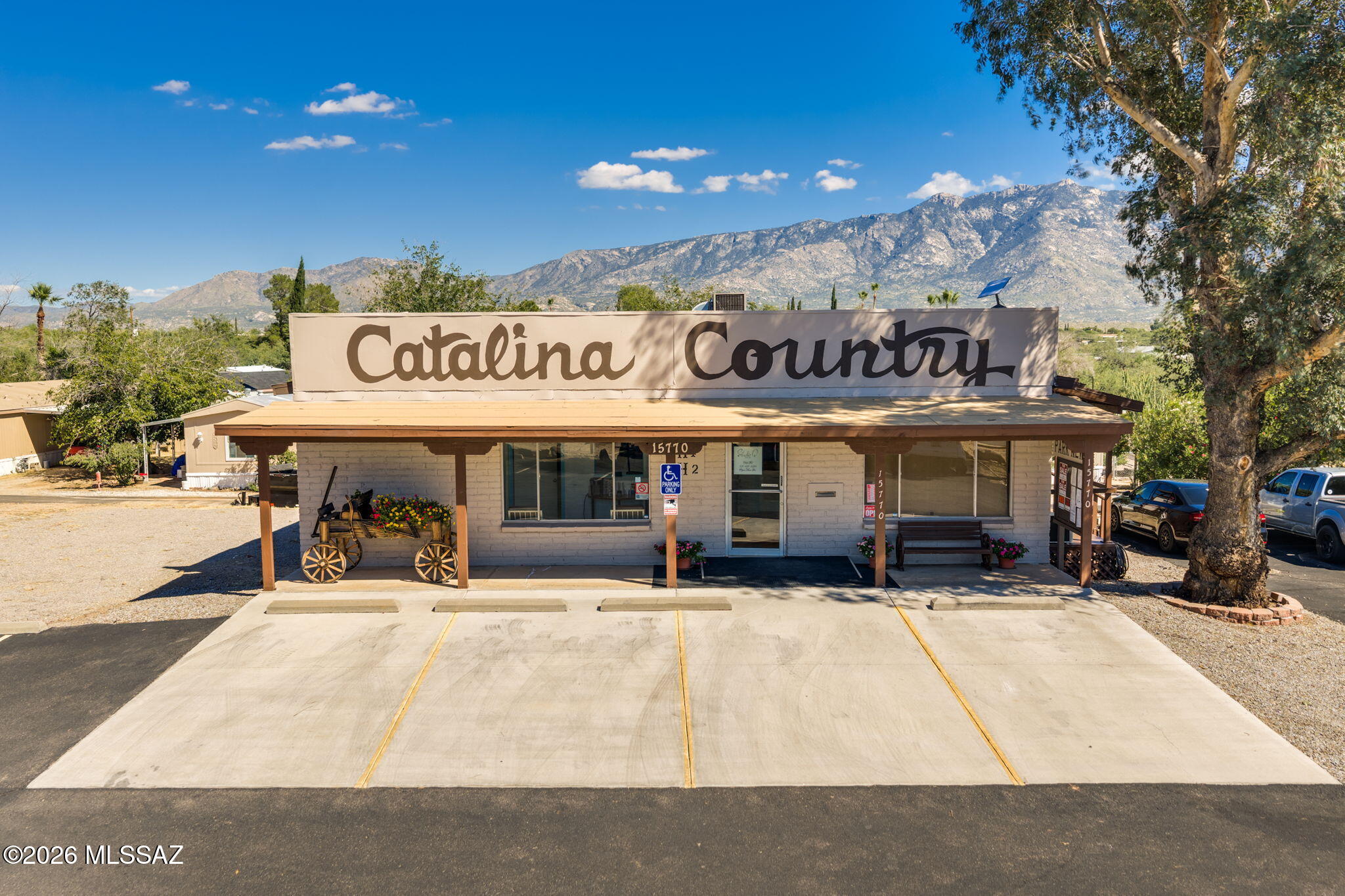 Bring your business vision to this inviting 780 square foot space for lease within the Catalina Country building. Fresh paint, new wood-look laminate flooring, and exposed brick create a warm, refreshed interior, while natural light and mountain views enhance the setting. The open layout offers flexibility for arranging your workspace, with a utility sink and separate enclosed shower adding convenience. The building also houses the community's property management office and a salon, with a reception area and restrooms shared by building occupants. Ample parking and direct access from Oracle Road make arrival convenient for clients and visitors. Zoned GZ-1. Prospective tenants to verify suitability for their intended use.