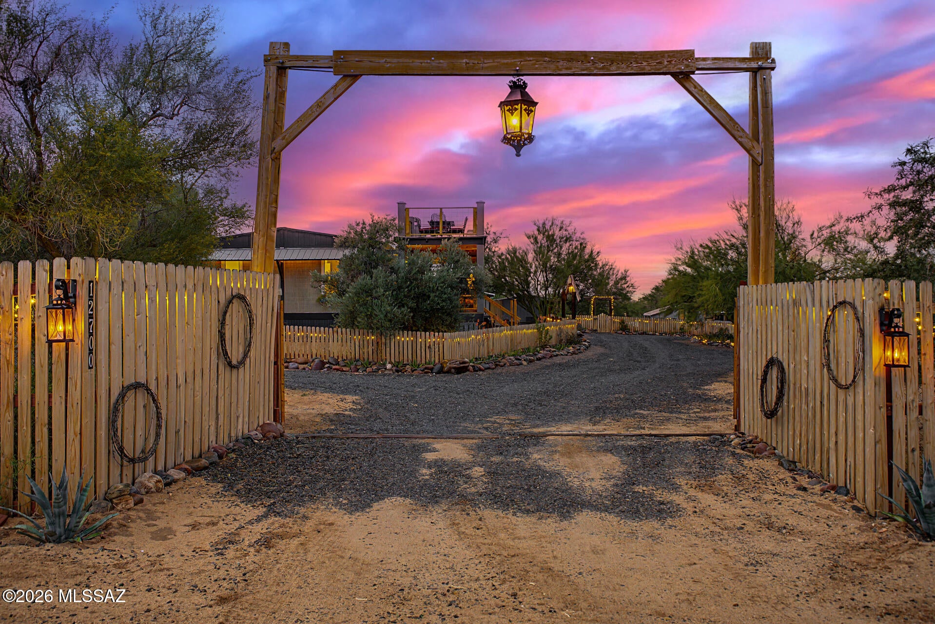 MOVE-IN READY! This desert oasis features a backyard retreat including two patios, a lounging area over a private pond with a sitting deck, an additional sitting area with a fire pit and so much available space to make this home a lifestyle for relaxation, comfort, and privacy.

This home is fully fenced with a double deck connected by stairs in the front of the home for watching the Arizona skies. No HOA is a huge plus! Horse property as well. This beautifully updated home inside and out is situated on 3.69 acres. This unique property features 3 bedrooms, 2 bathrooms, an impressive 4-car detached garage complete with a workshop featuring a loft space with an electric fireplace, and built-in cabinetry, a chicken coop, 3 sheds for tools, pottery, and a wood-fire sauna, a greenhouse with MOVE-IN READY! This desert oasis features a backyard retreat including two patios, a lounging area over a private pond with a sitting deck, an additional sitting area with a fire pit and so much available space to make this home a lifestyle for relaxation, comfort, and privacy.

This home is fully fenced with a double deck connected by stairs in the front of the home for watching the Arizona skies. No HOA is a huge plus! Horse property as well. This beautifully updated home inside and out is situated on 3.69 acres. This unique property features 3 bedrooms, 2 bathrooms, an impressive 4-car detached garage complete with a workshop featuring a loft space with an electric fireplace, and built-in cabinetry, a chicken coop, 3 sheds for tools, pottery, and a wood-fire sauna, a greenhouse with a vegetable garden, 2800 gallon rainwater harvesting tank that is connected to the gutters on the home, and approximately 586 sq ft barn. 

Step inside to an inviting open floor plan showcasing exposed faux wood beams on the ceiling, abundant natural light, gorgeous laminate flooring, and a freestanding wood-burning fireplace accented by a striking stacked-stone wall, creating a warm and welcoming atmosphere. The charming eat-in kitchen features stainless steel appliances, a gas stove cooktop, butcher-block countertops, wall wood accents, a farmhouse sink, and a convenient breakfast bar for casual dining. 

The spacious main primary suite offers direct deck access and a private bathroom featuring a large custom-tiled shower with a single vanity. The second bedroom provides a cozy gas fireplace, a shared jack and jill bathroom including a shower/tub combo with single vanity, and direct patio access, offering comfort and privacy. The remaining bedroom is ample size and shares the second bathroom. Perfect for entertaining overnight friends and family. The laundry is conveniently located inside. Washer & dryer to convey. 

Step outside to your own peaceful desert retreat! The expansive backyard features multiple covered patios, low-maintenance artificial turf, mature desert trees, and a tranquil pond-like water feature, creating an ideal setting for outdoor relaxation and entertainment. Take in the breathtaking mountain views and picturesque Sonoran Desert surroundings while enjoying the space and freedom this exceptional property offers.

Conveniently located near Three Points Veterans Memorial Park. 25 minutes away to shopping, dining, and outdoor recreation throughout the Tucson area. Move-in ready with endless possibilities! Don't miss this incredible opportunity to experience the best of Arizona desert living!

The furnishing can be conveyed with the sale.