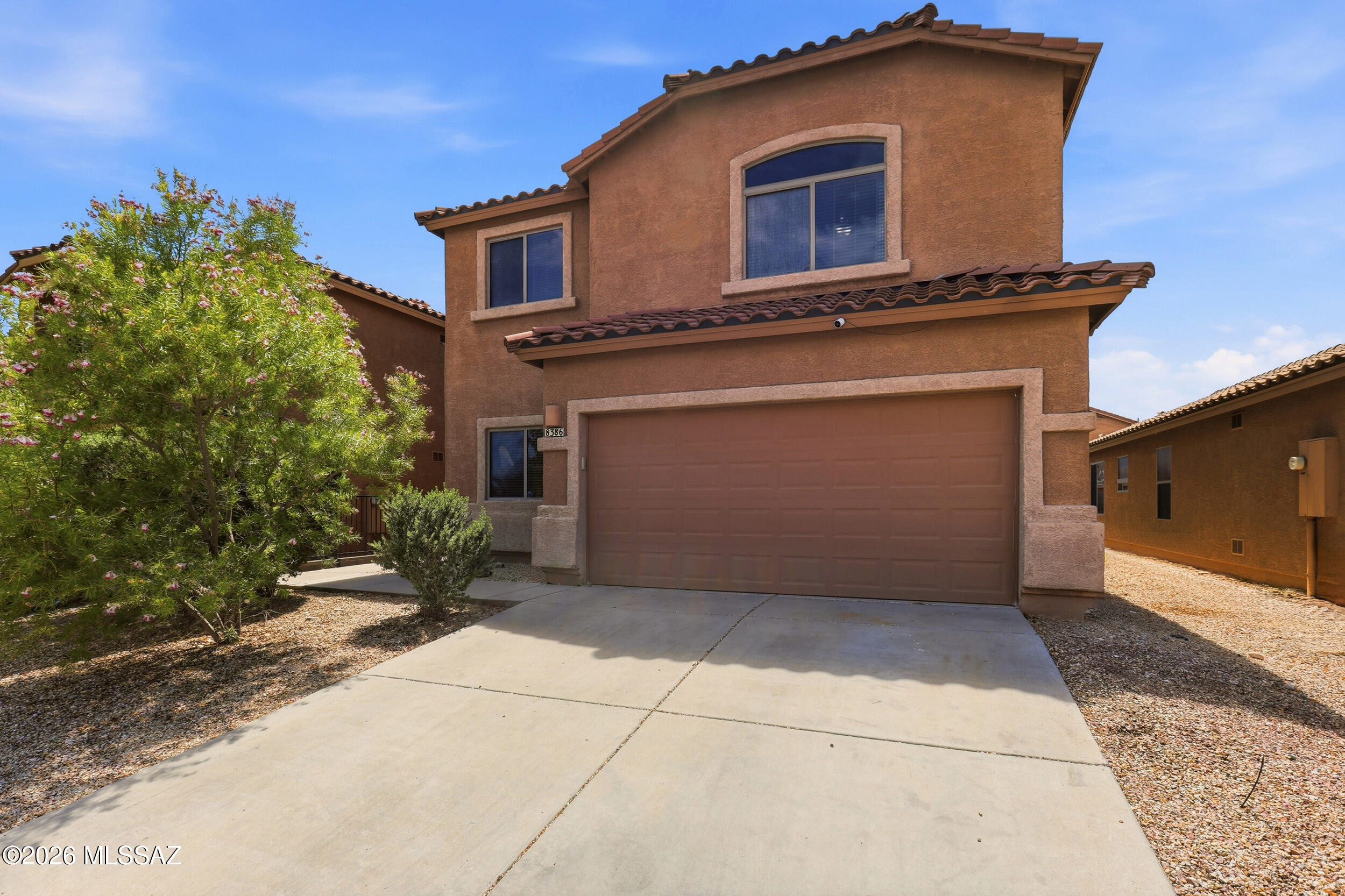 This spacious two-story home offers 2,199 sq. ft. with 4 bedrooms, 3 bathrooms, and a flexible front room perfect for a playroom or home office. Enjoy a beautifully landscaped backyard and access to a neighborhood pool. Conveniently located near Fry's, shopping, dining, and top-rated Vail schools, this home is ready to welcome you!